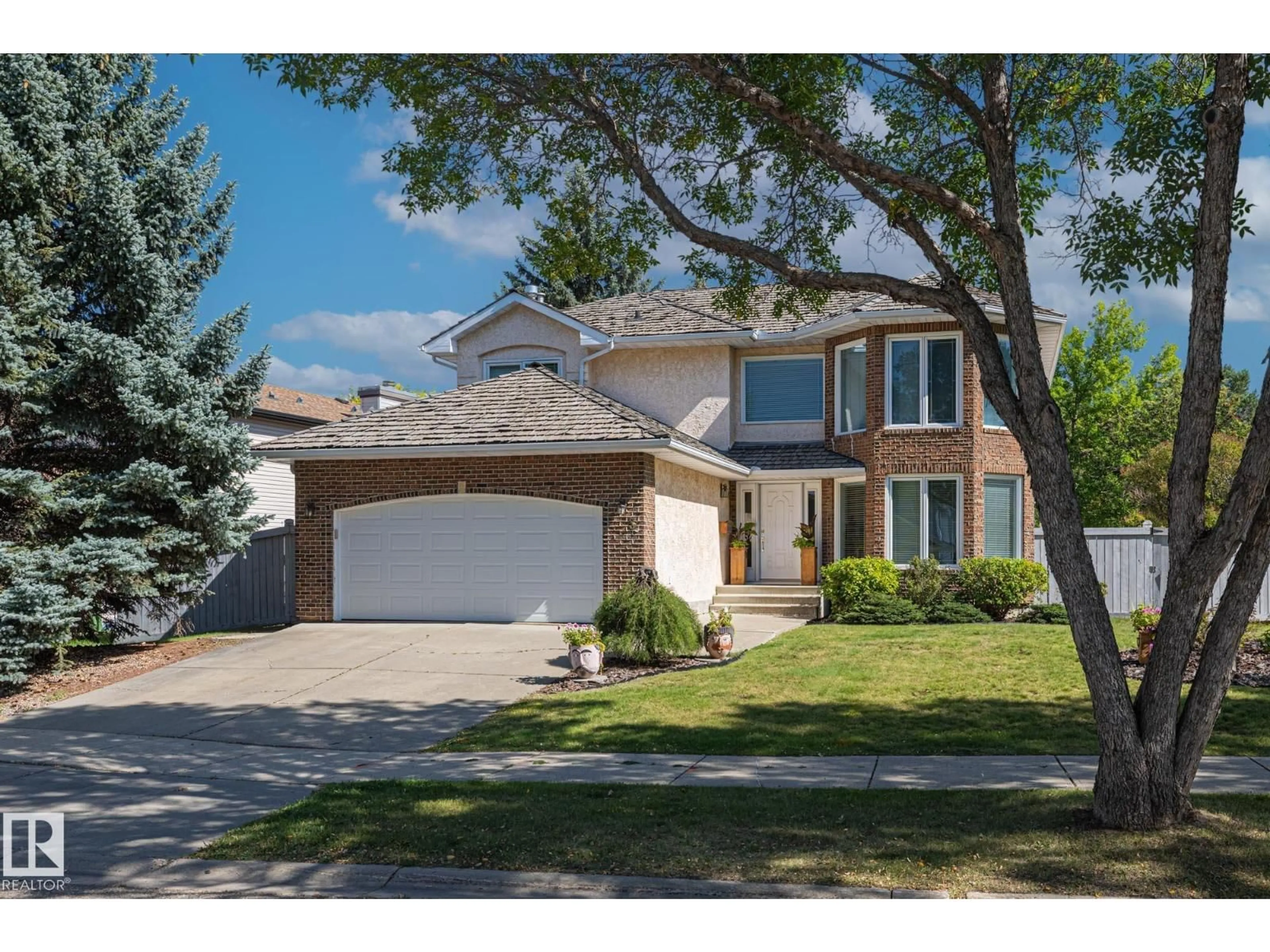 Home with vinyl exterior material, street for 3 HARNOIS PL, St. Albert Alberta T8N5R2