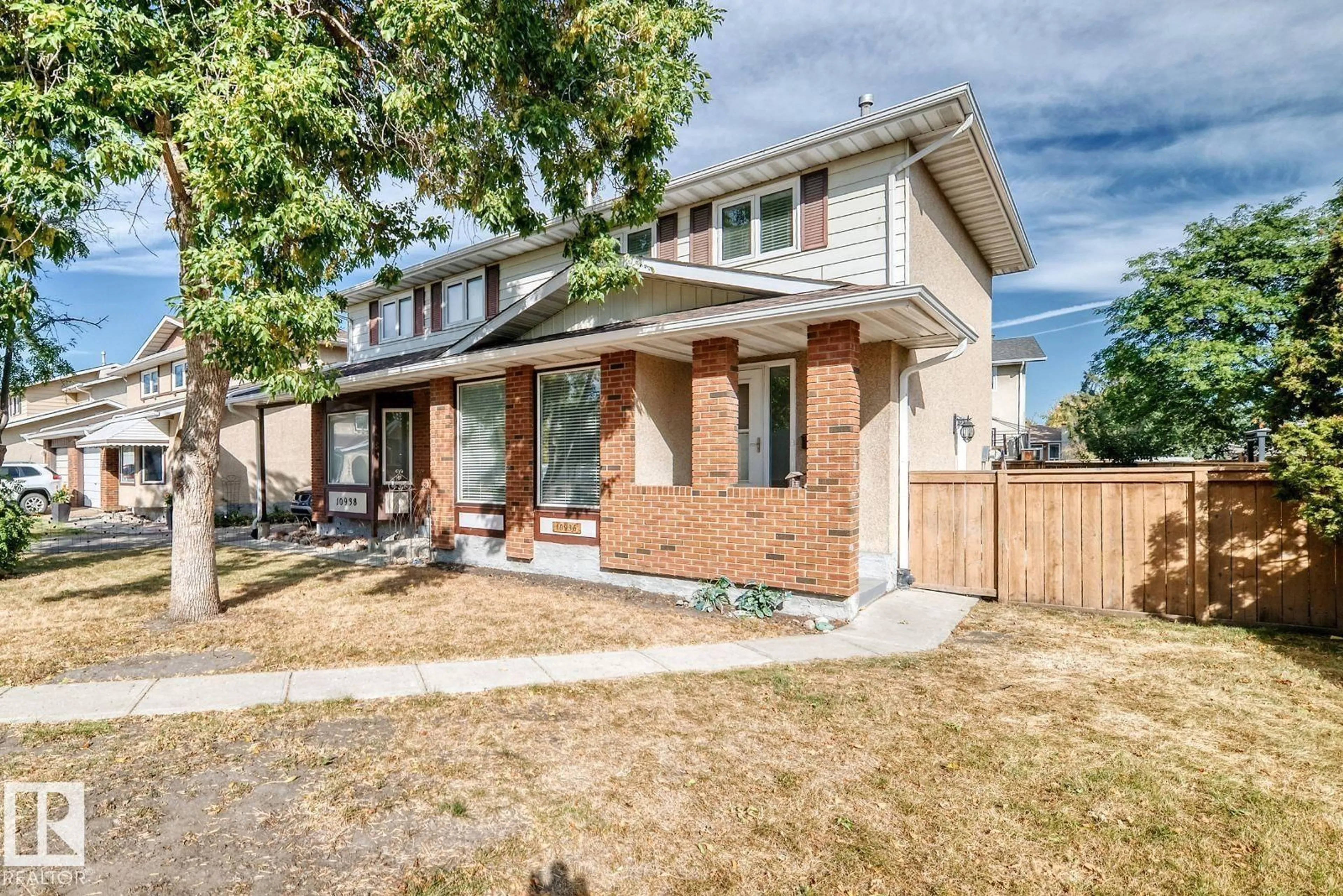 Home with brick exterior material, street for 10936 BEAUMARIS RD, Edmonton Alberta T5X1Z6