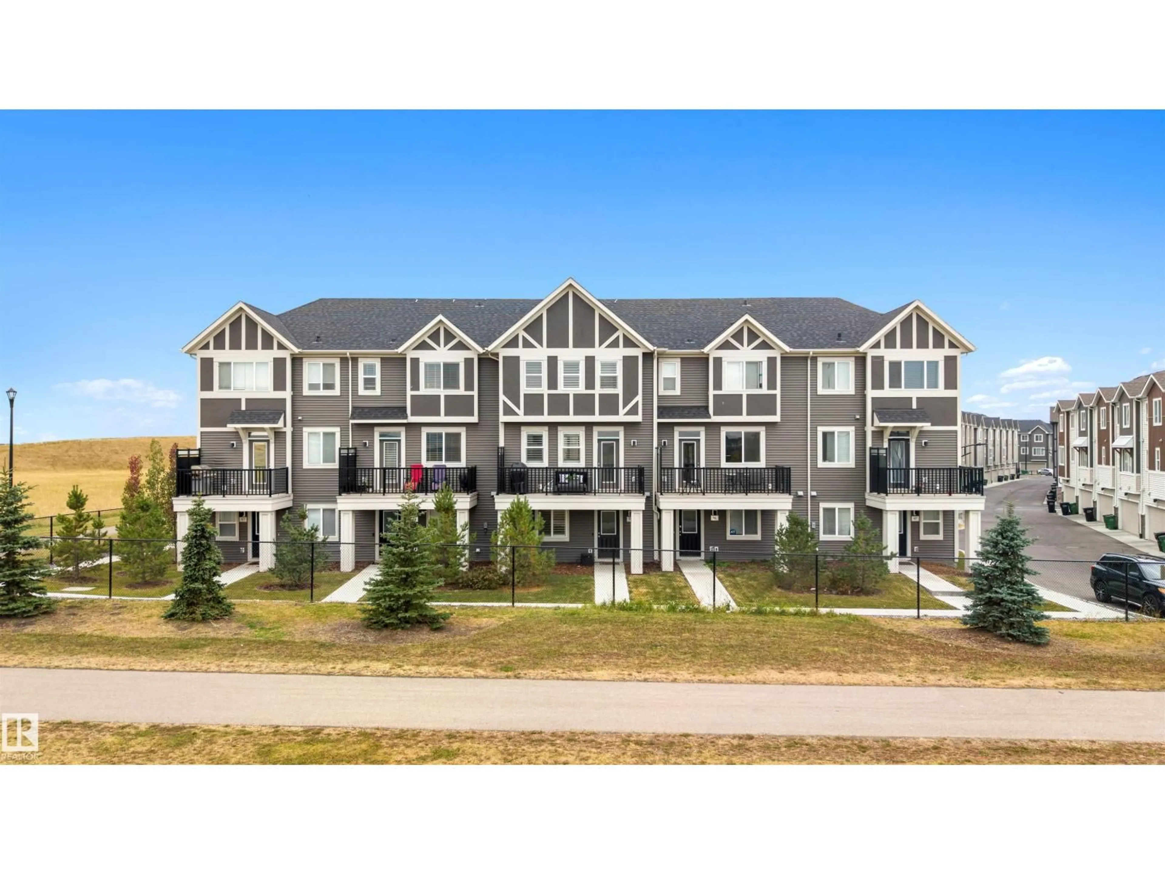 A pic from outside/outdoor area/front of a property/back of a property/a pic from drone, mountain view for #95 - 2072 WONNACOTT WY, Edmonton Alberta T6X2V7