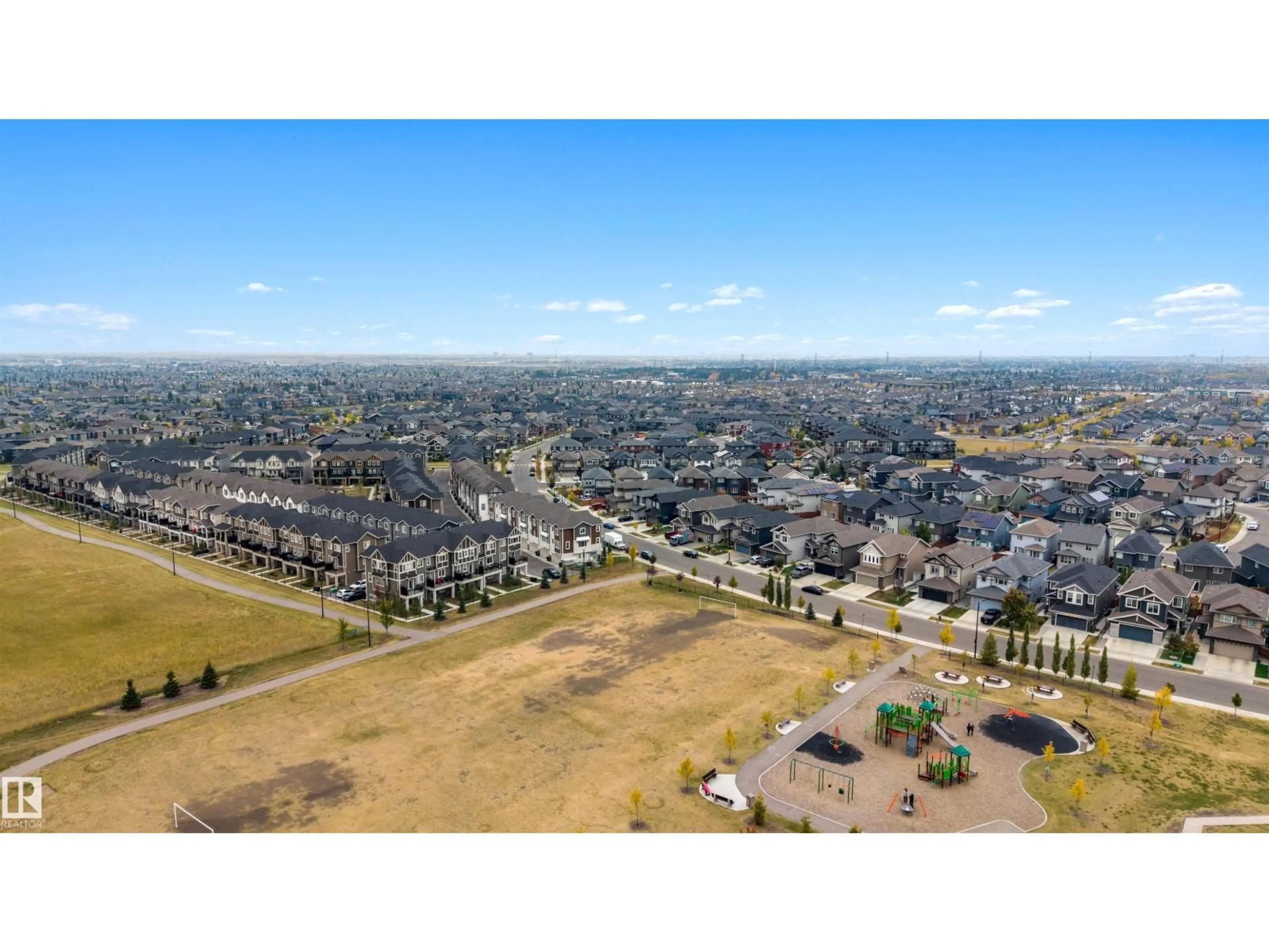 A pic from outside/outdoor area/front of a property/back of a property/a pic from drone, mountain view for #95 - 2072 WONNACOTT WY, Edmonton Alberta T6X2V7