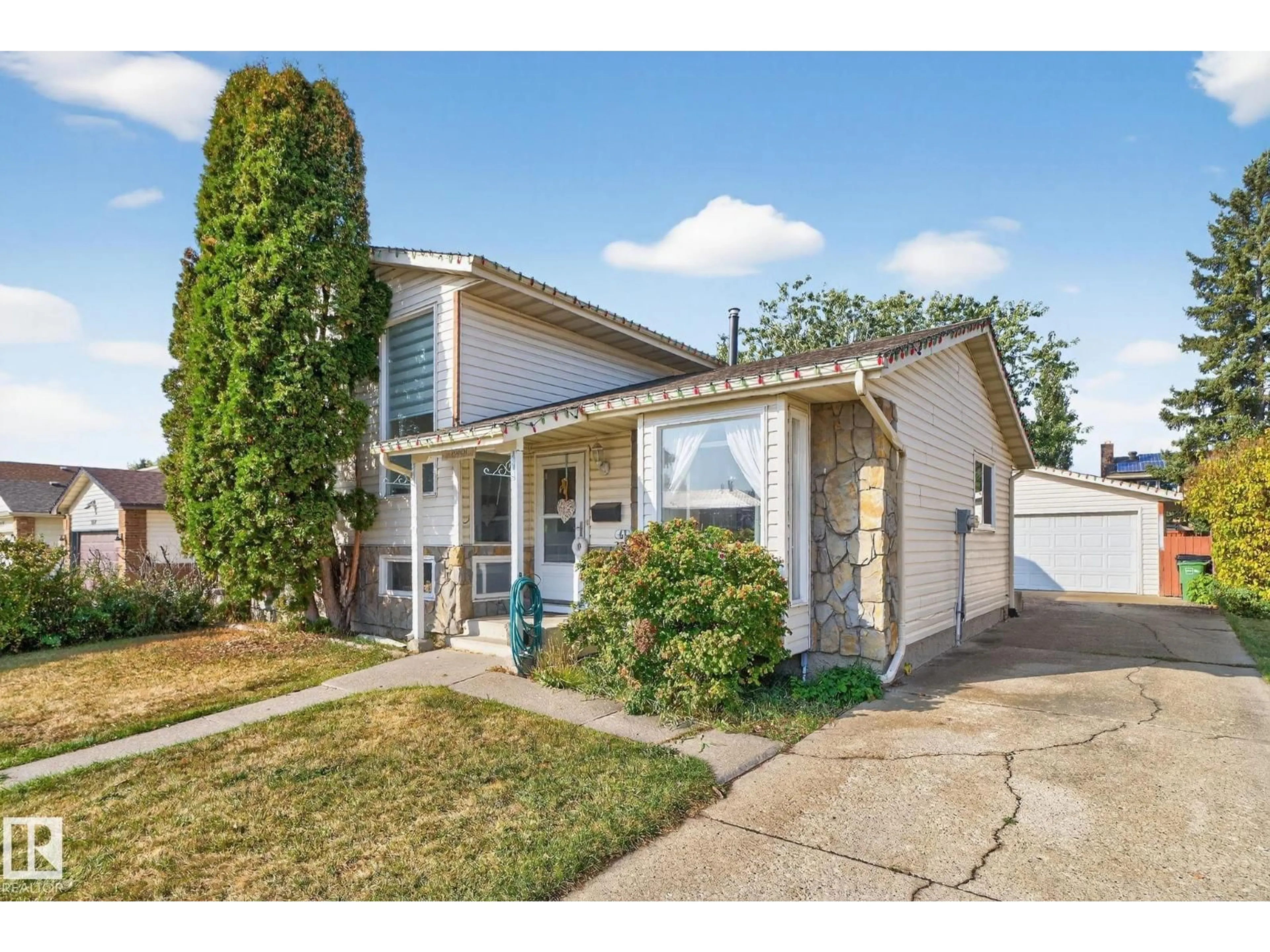 Home with vinyl exterior material, street for 3608 51 ST NW, Edmonton Alberta T6L1C6