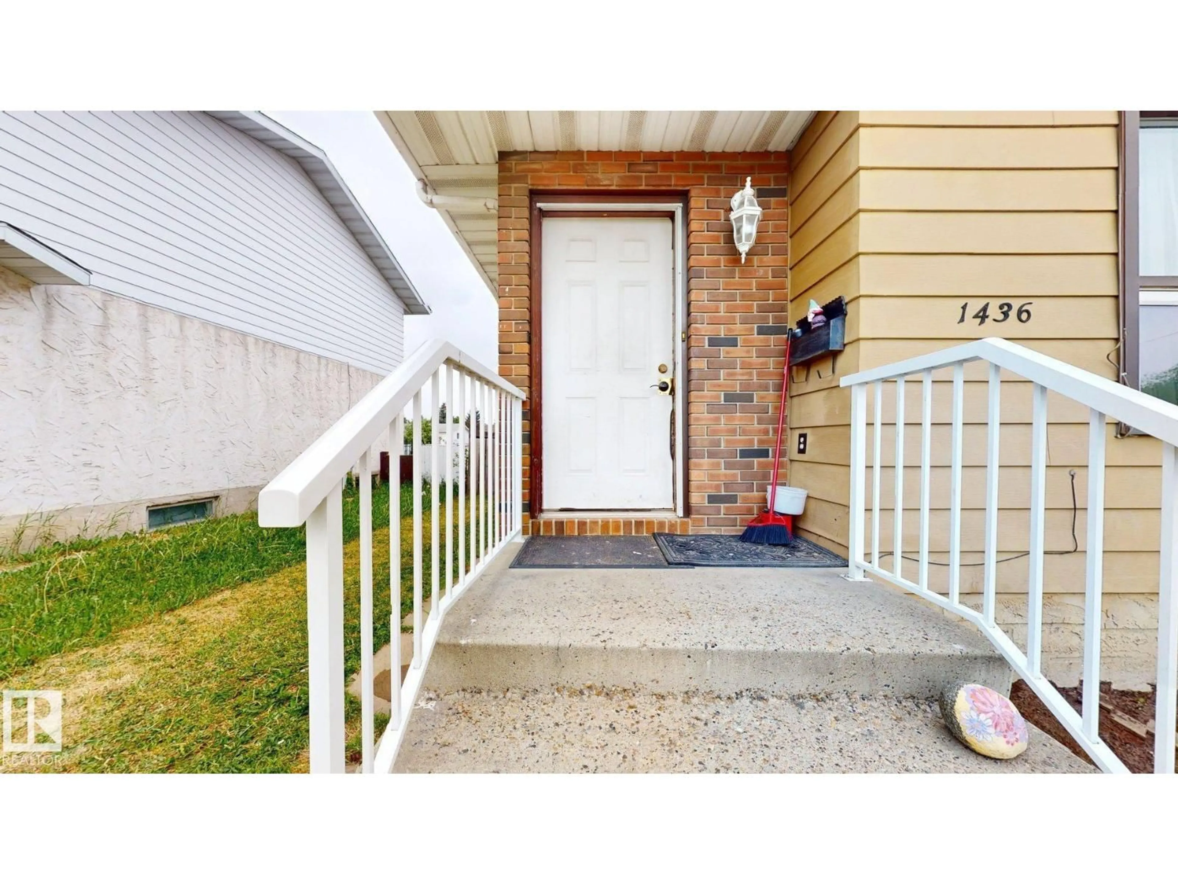 Home with vinyl exterior material, street for 1436 62 ST, Edmonton Alberta T6L1S8