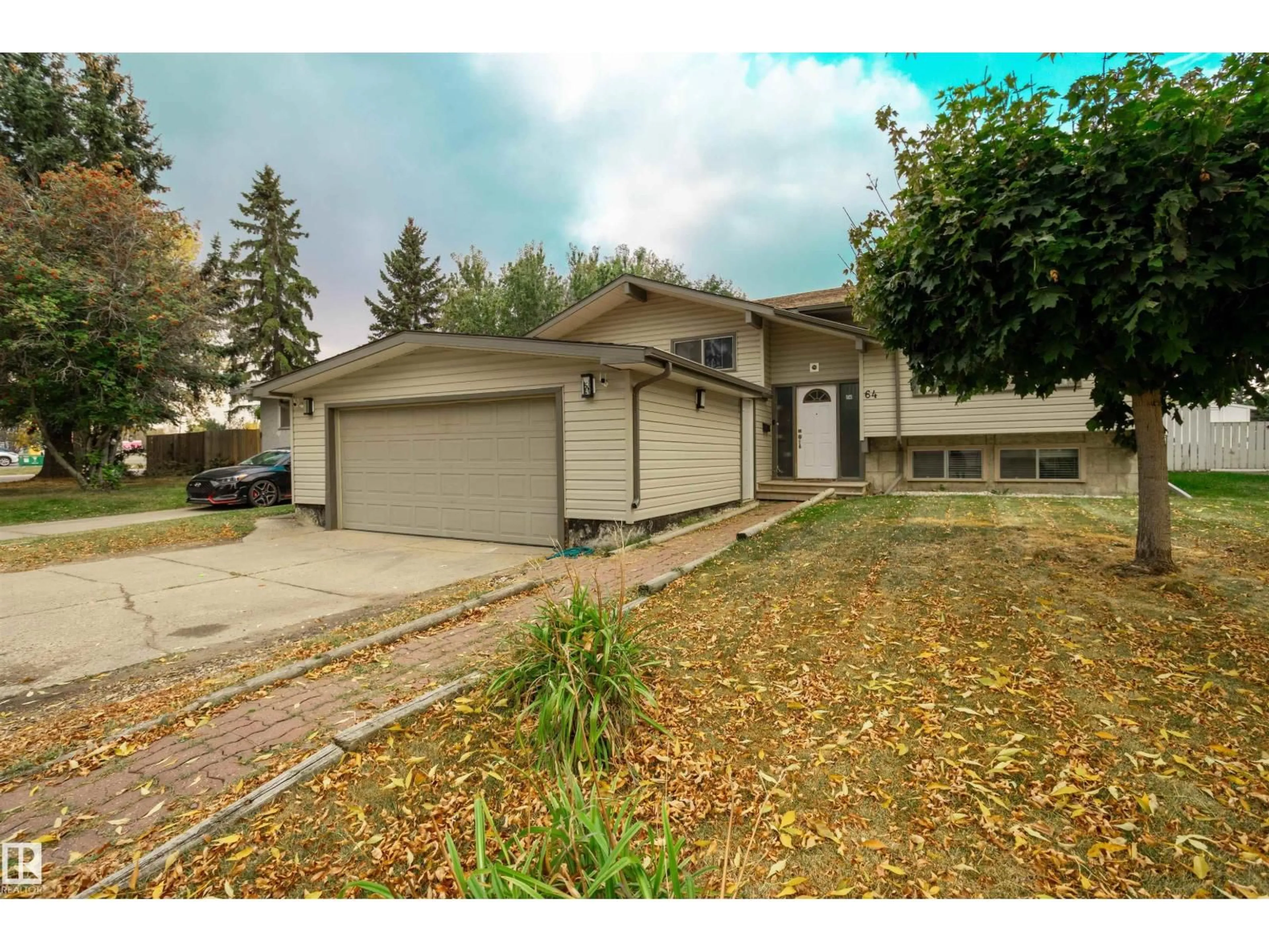 Home with vinyl exterior material, street for 64 GREENWOOD WY, Sherwood Park Alberta T8A0J5