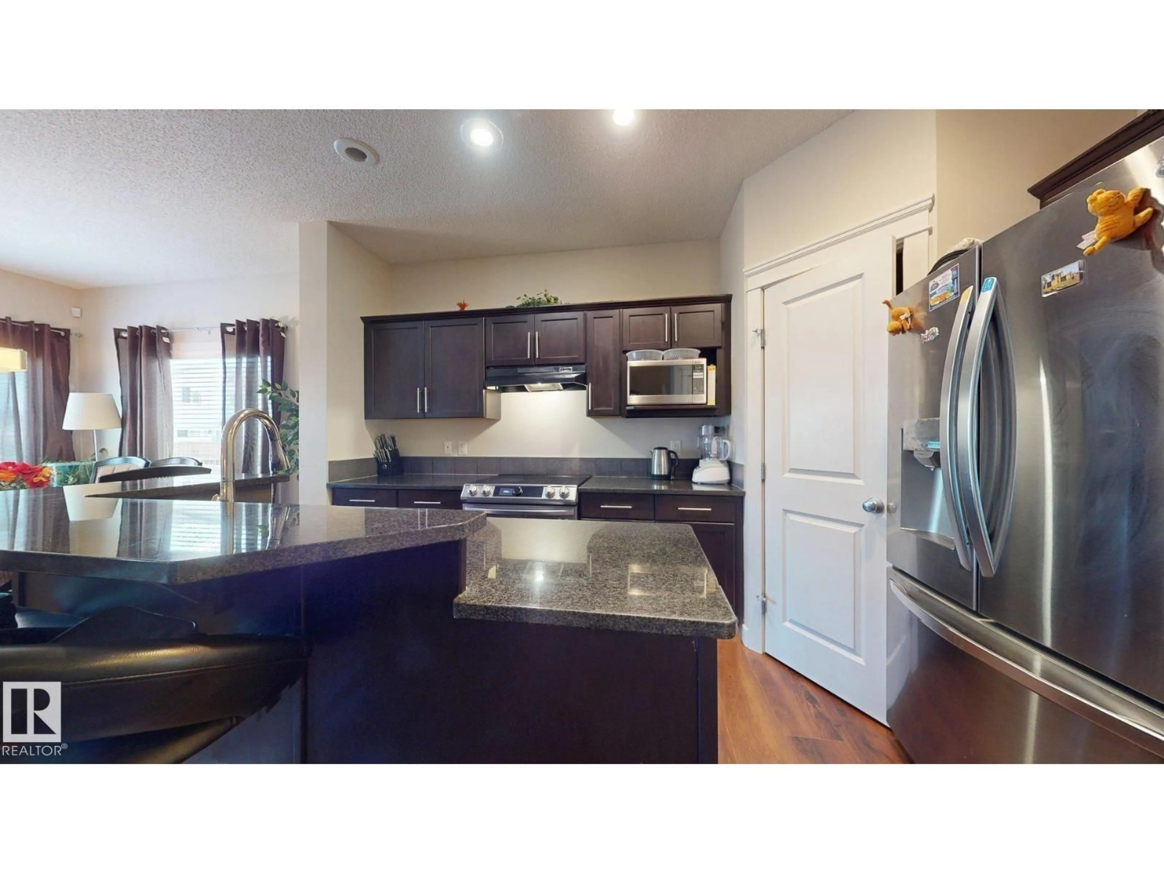 Open concept kitchen, unknown for 2917 16 A AV, Edmonton Alberta T6T0P8