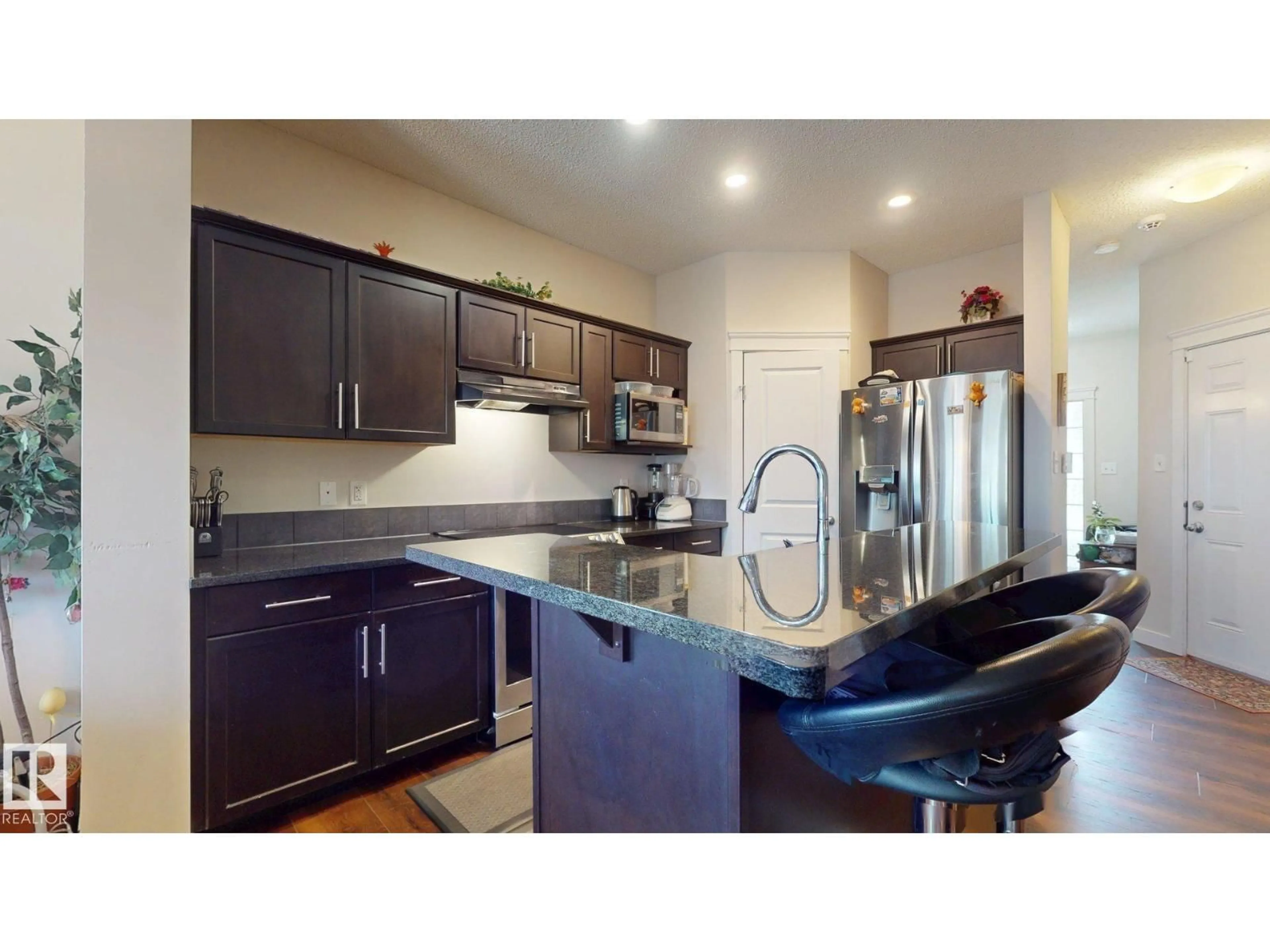 Open concept kitchen, unknown for 2917 16 A AV, Edmonton Alberta T6T0P8