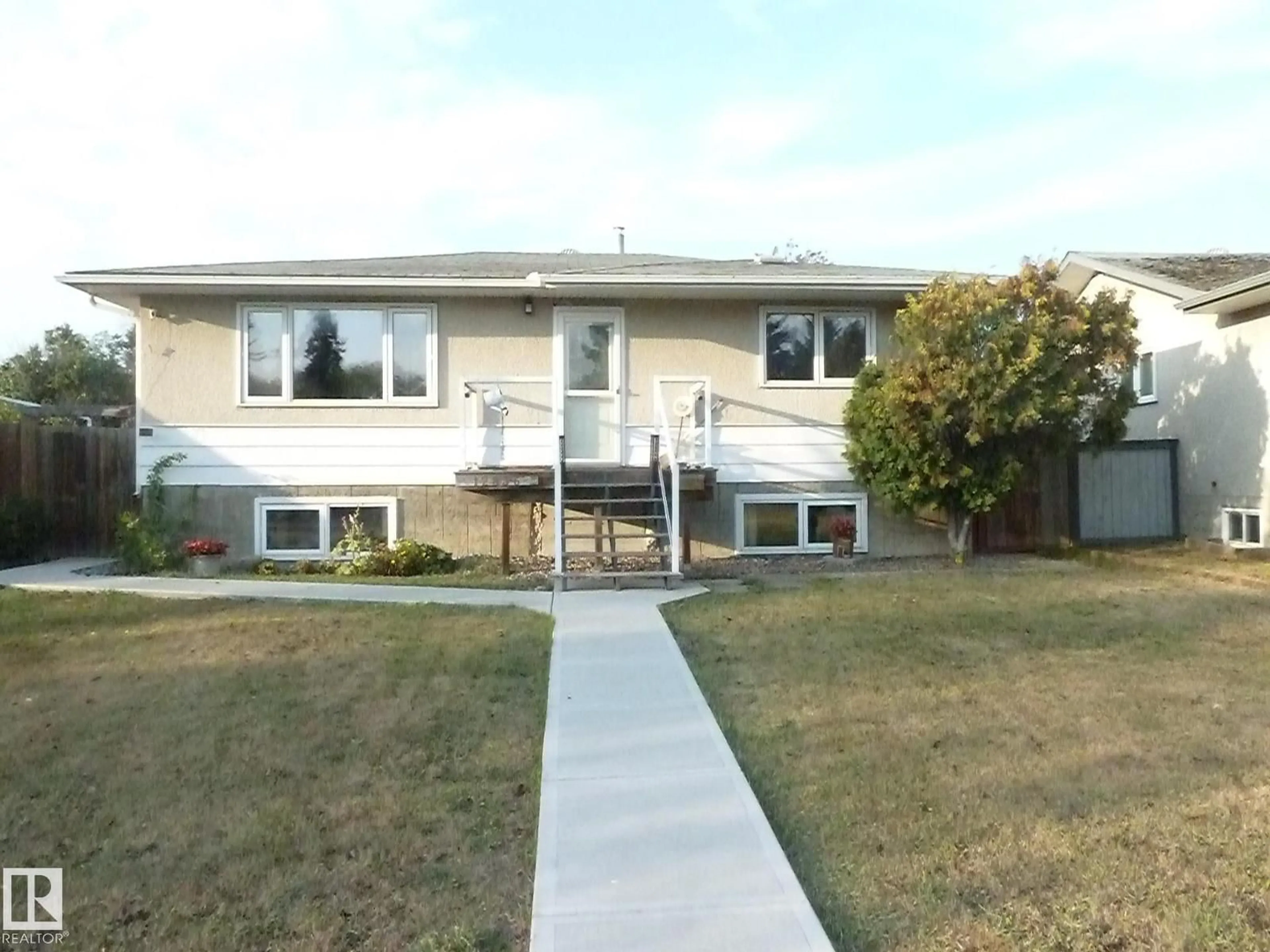 Home with vinyl exterior material, street for 12836 107 ST NW, Edmonton Alberta T5E4V3