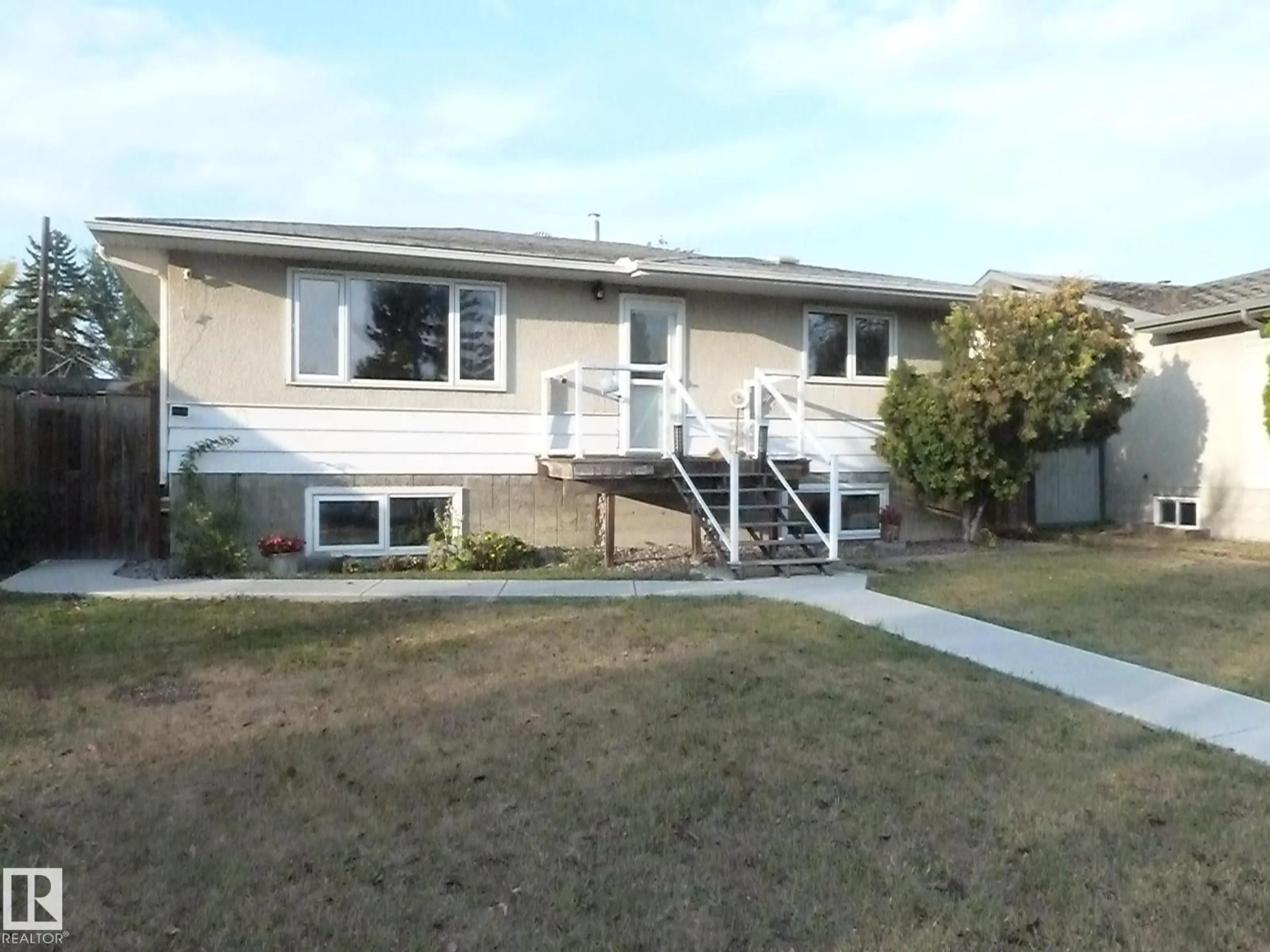 Home with vinyl exterior material, street for 12836 107 ST NW, Edmonton Alberta T5E4V3