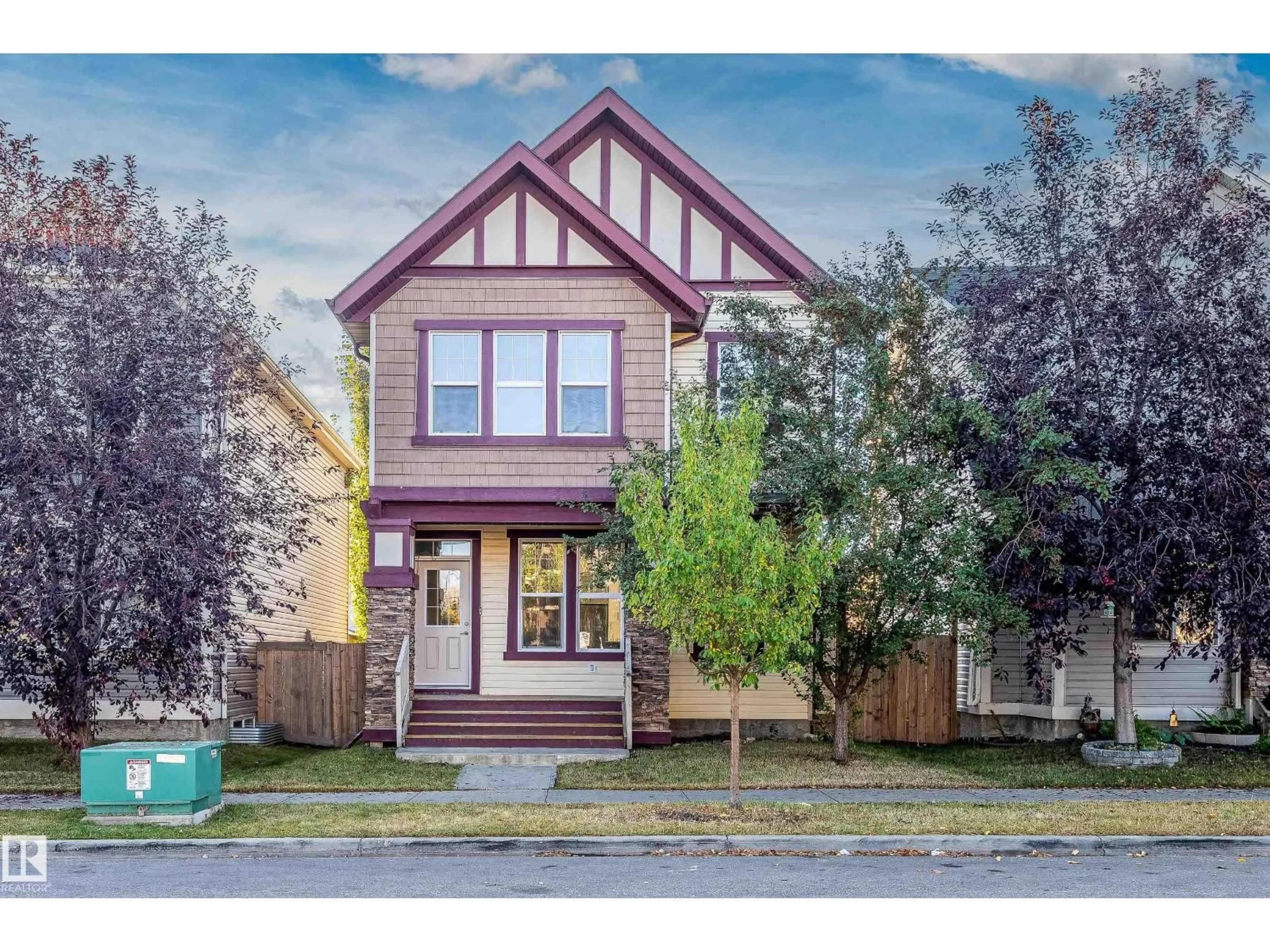Home with vinyl exterior material, street for 1065 MCCONACHIE BV, Edmonton Alberta T5Y0P7