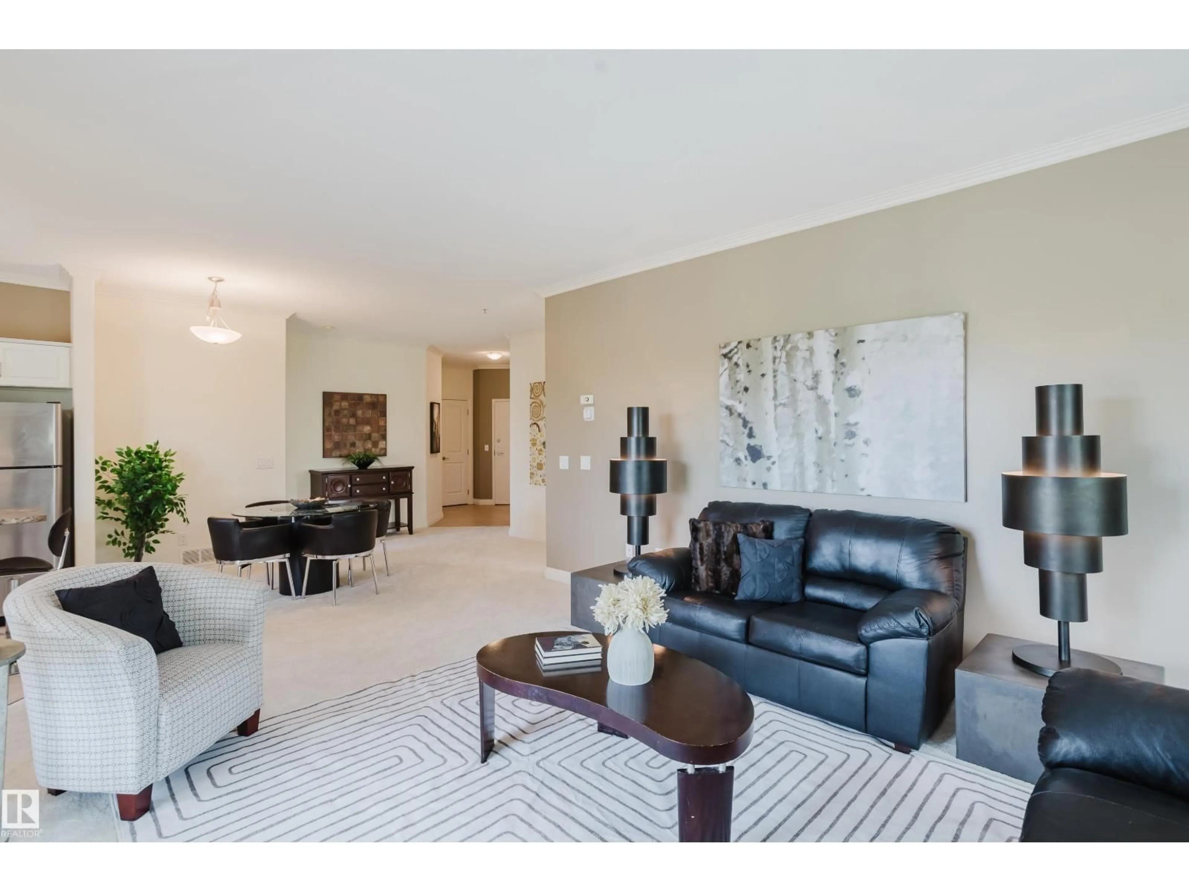 Living room with furniture, carpet floor for 402 14205 96 AV NW, Edmonton Alberta T5N0C2