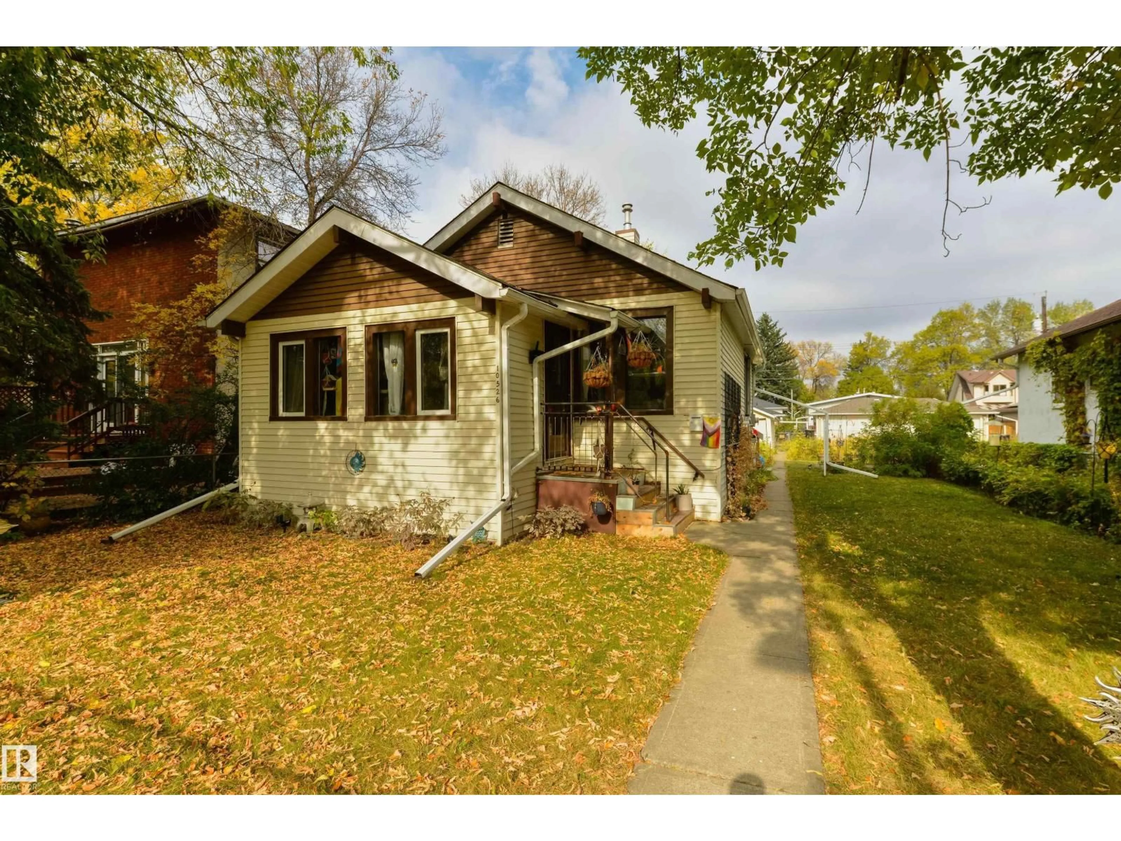 Home with brick exterior material, street for 10526 74 AV, Edmonton Alberta T6E1G2