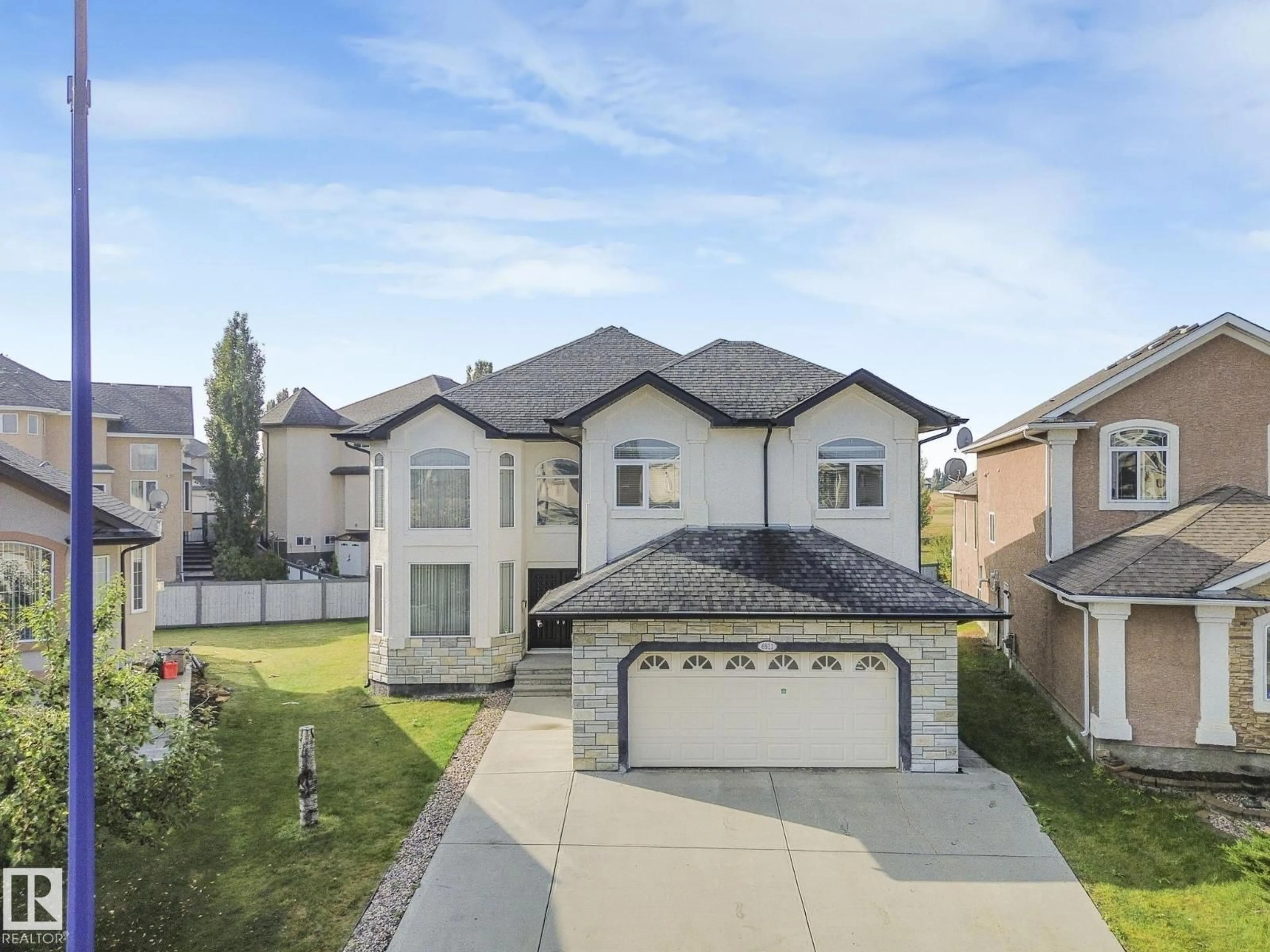 A pic from outside/outdoor area/front of a property/back of a property/a pic from drone, street for SW - 6911 17 AV, Edmonton Alberta T6X0C9