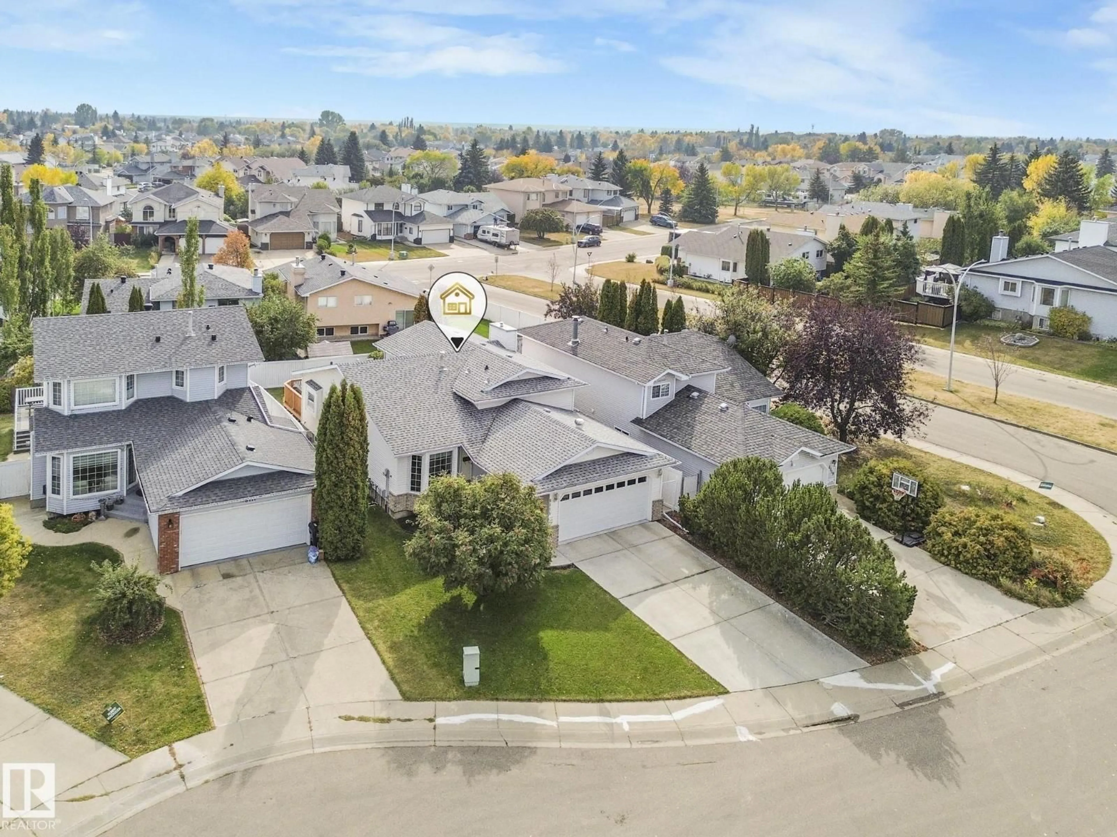 A pic from outside/outdoor area/front of a property/back of a property/a pic from drone, street for 6115 157 AV NW, Edmonton Alberta T5Y2P5