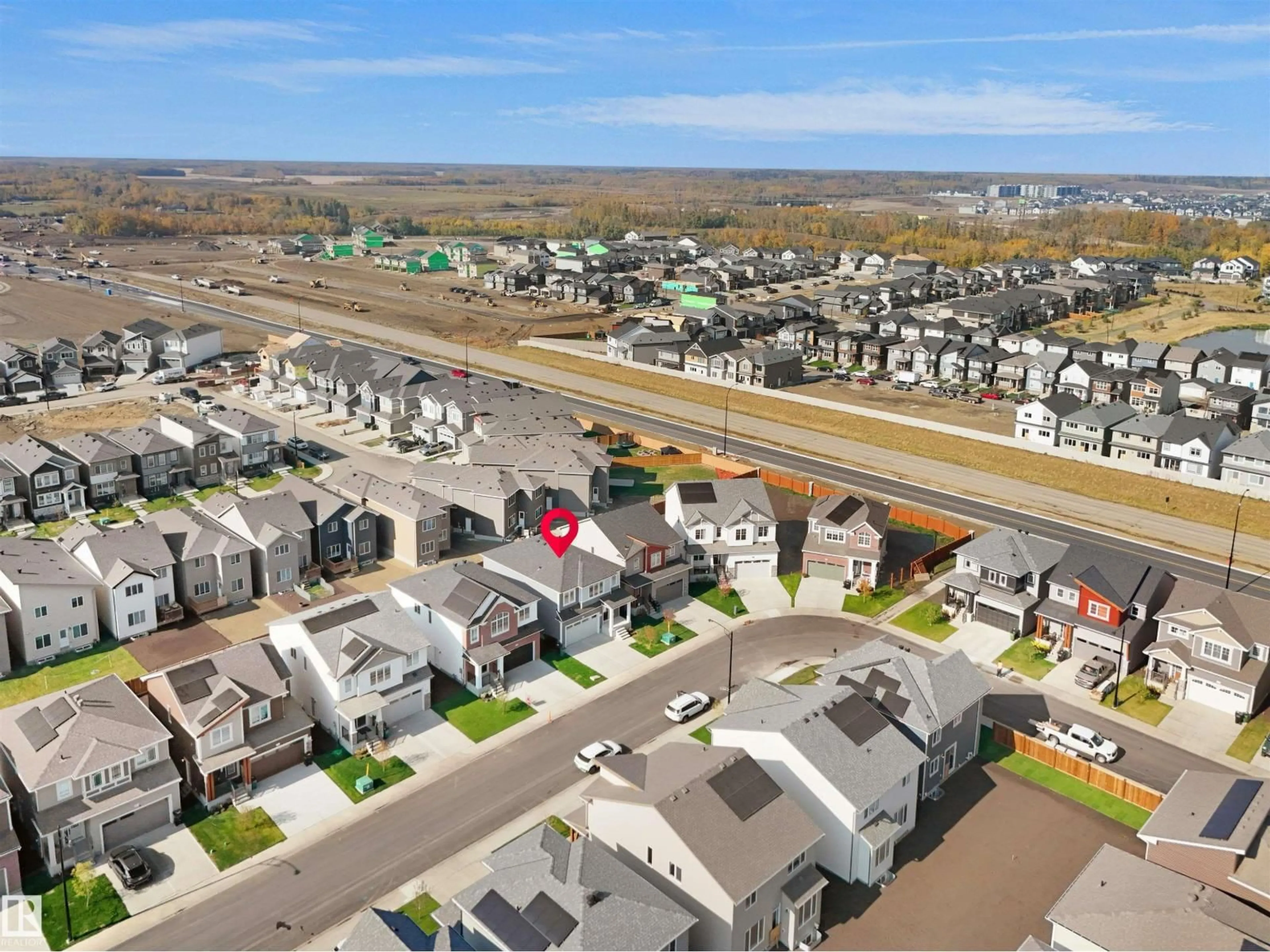 A pic from outside/outdoor area/front of a property/back of a property/a pic from drone, street for NW - 2124 209 ST, Edmonton Alberta T6M2X6