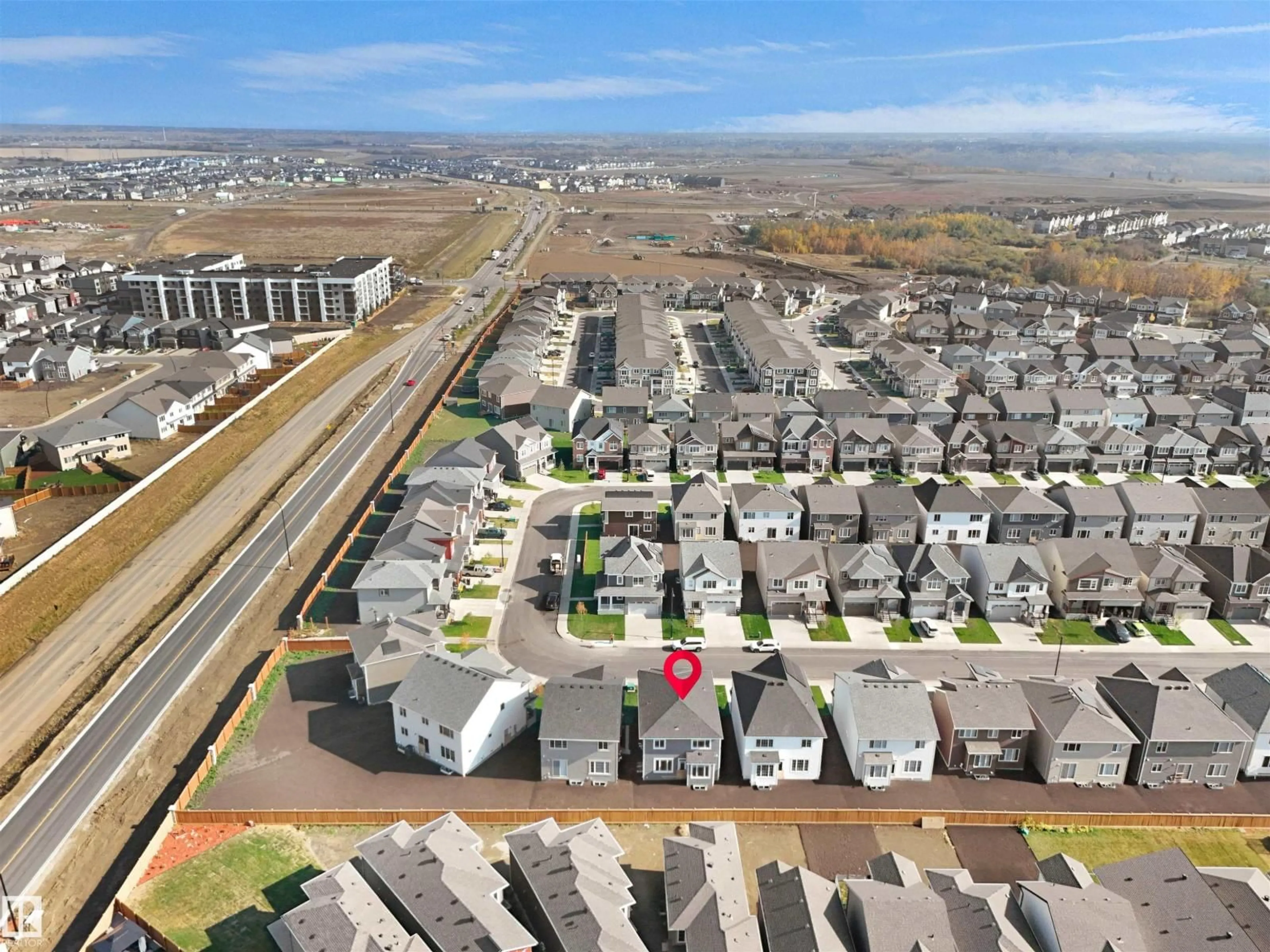 A pic from outside/outdoor area/front of a property/back of a property/a pic from drone, street for NW - 2124 209 ST, Edmonton Alberta T6M2X6