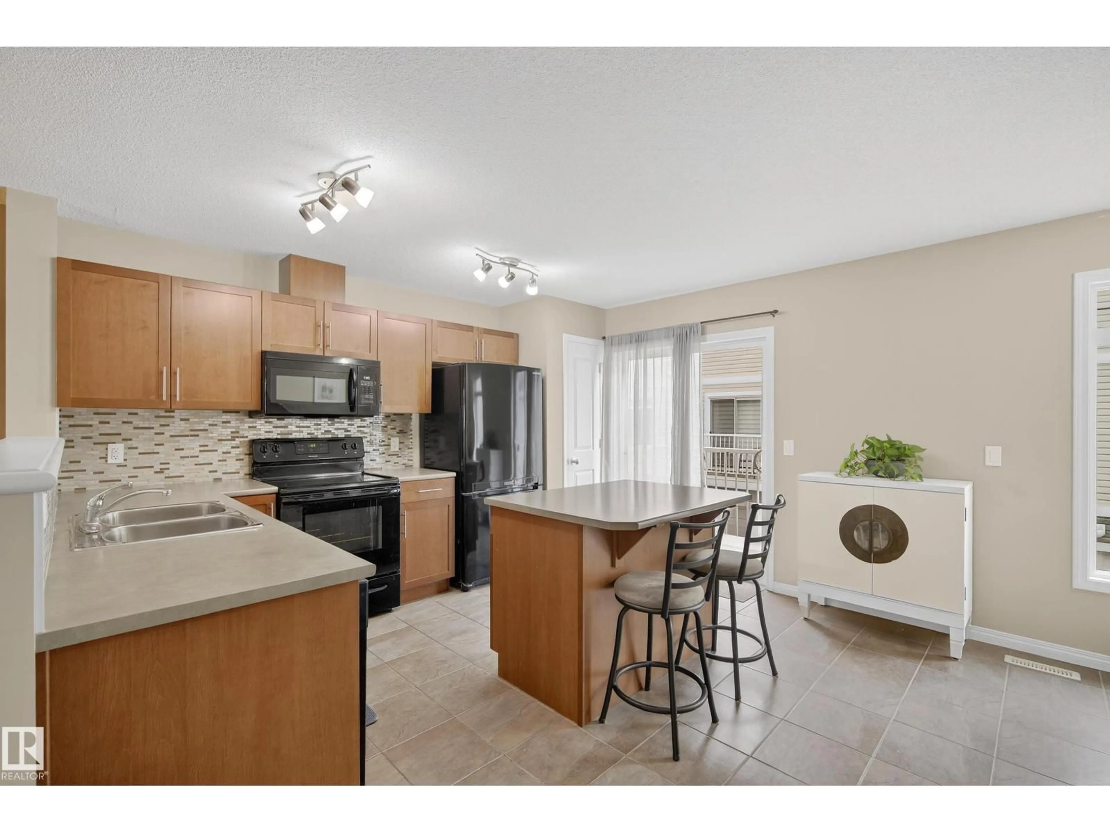 Open concept kitchen, ceramic/tile floor for 166 - 1804 70 ST, Edmonton Alberta T6X0H4