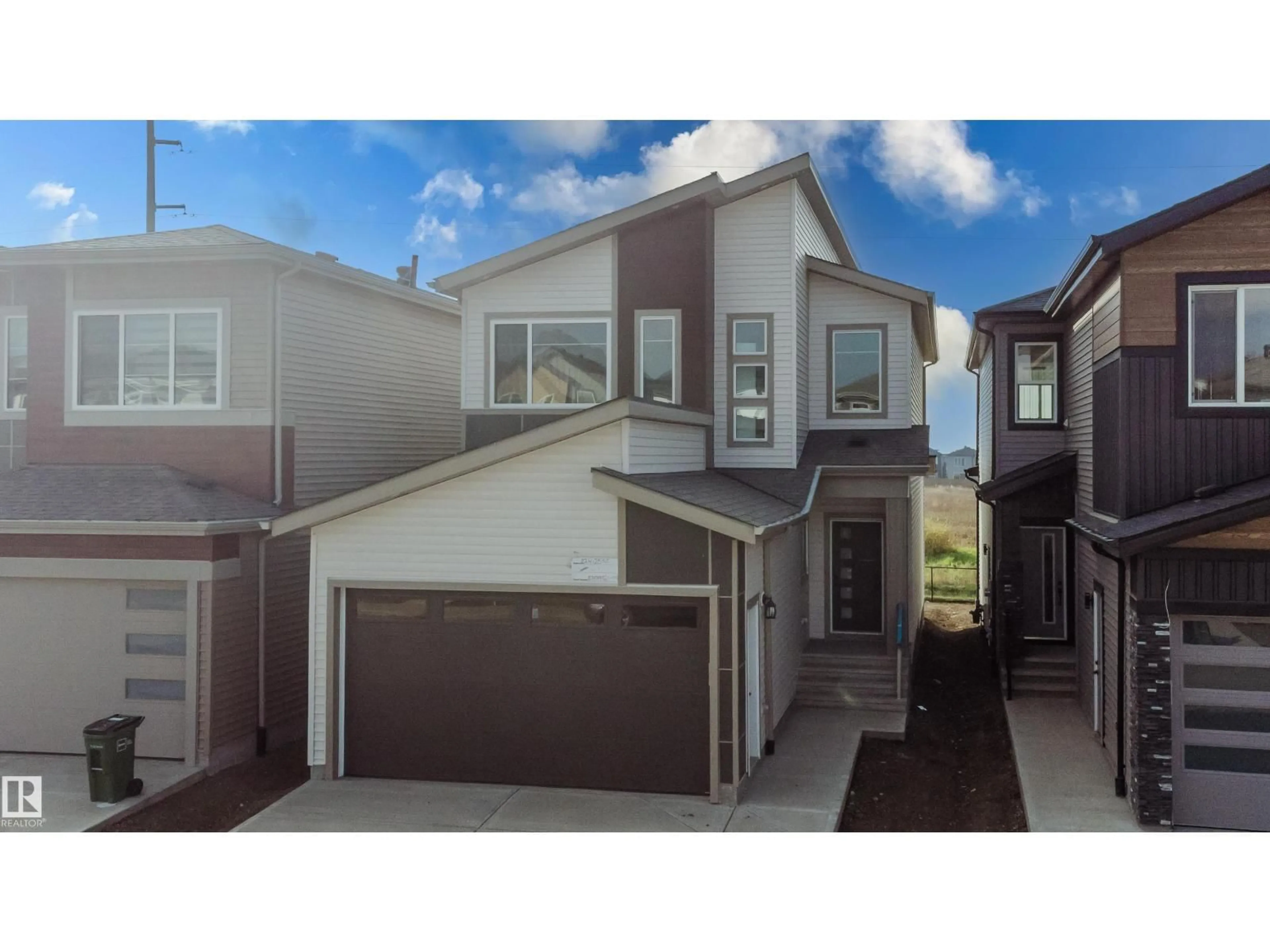 Home with vinyl exterior material, street for SW - 152 25 ST, Edmonton Alberta T6X3K3