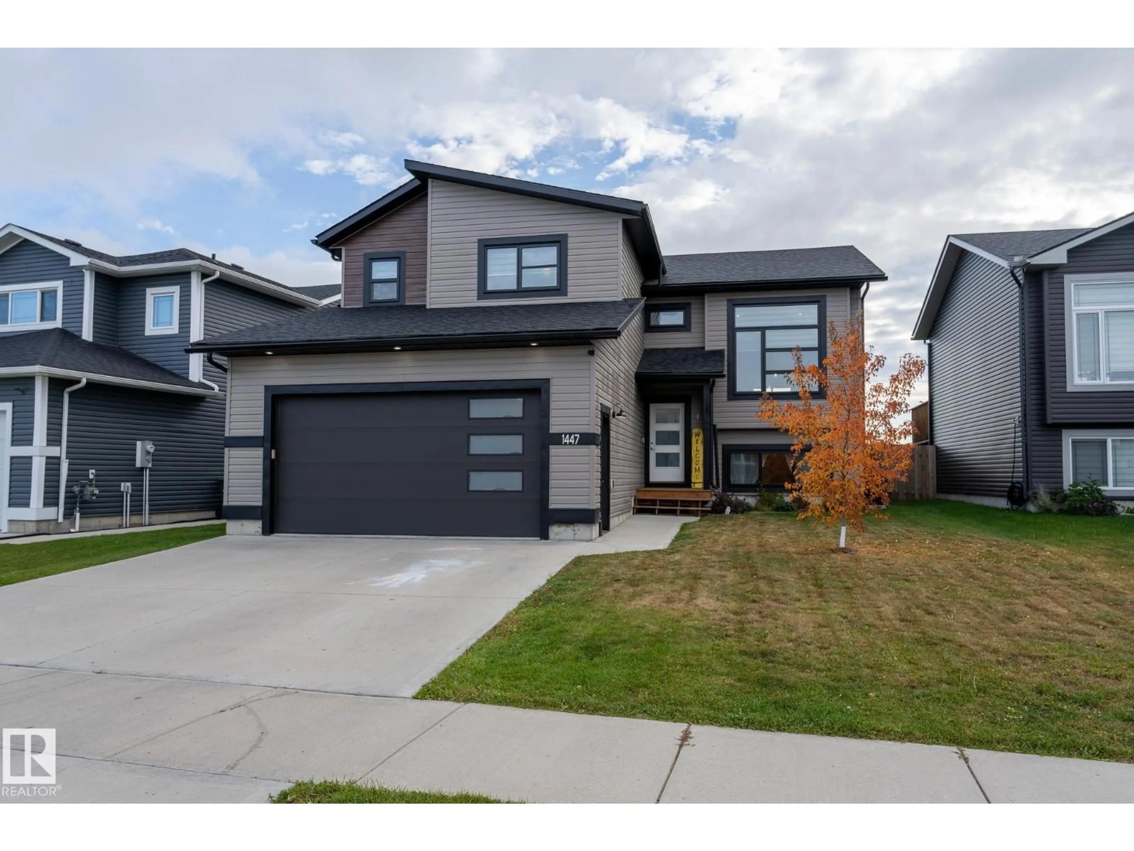 Home with brick exterior material, street for 1447 WILDRYE CR, Cold Lake Alberta T9M0E2