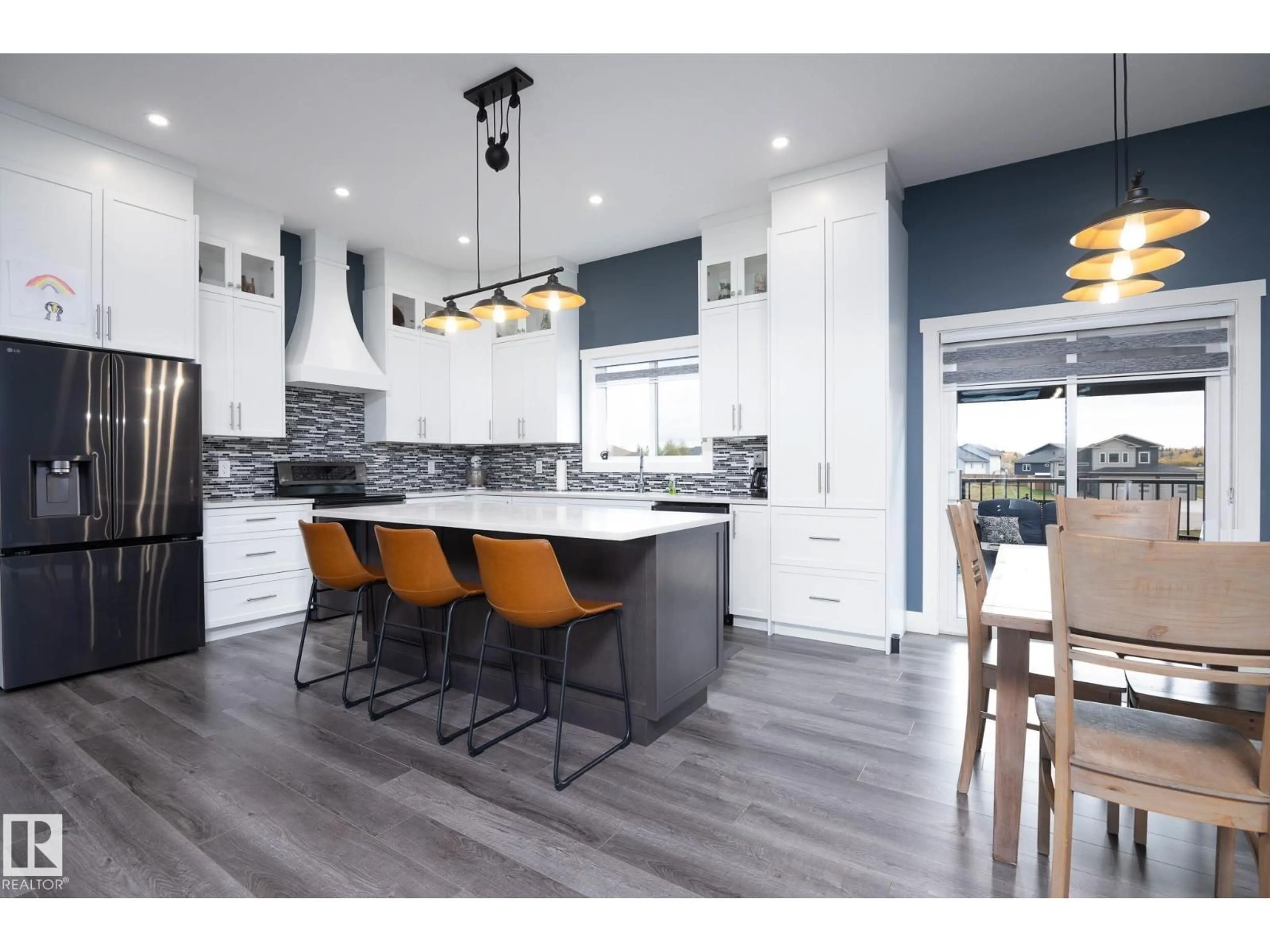 Open concept kitchen, wood/laminate floor for 1447 WILDRYE CR, Cold Lake Alberta T9M0E2
