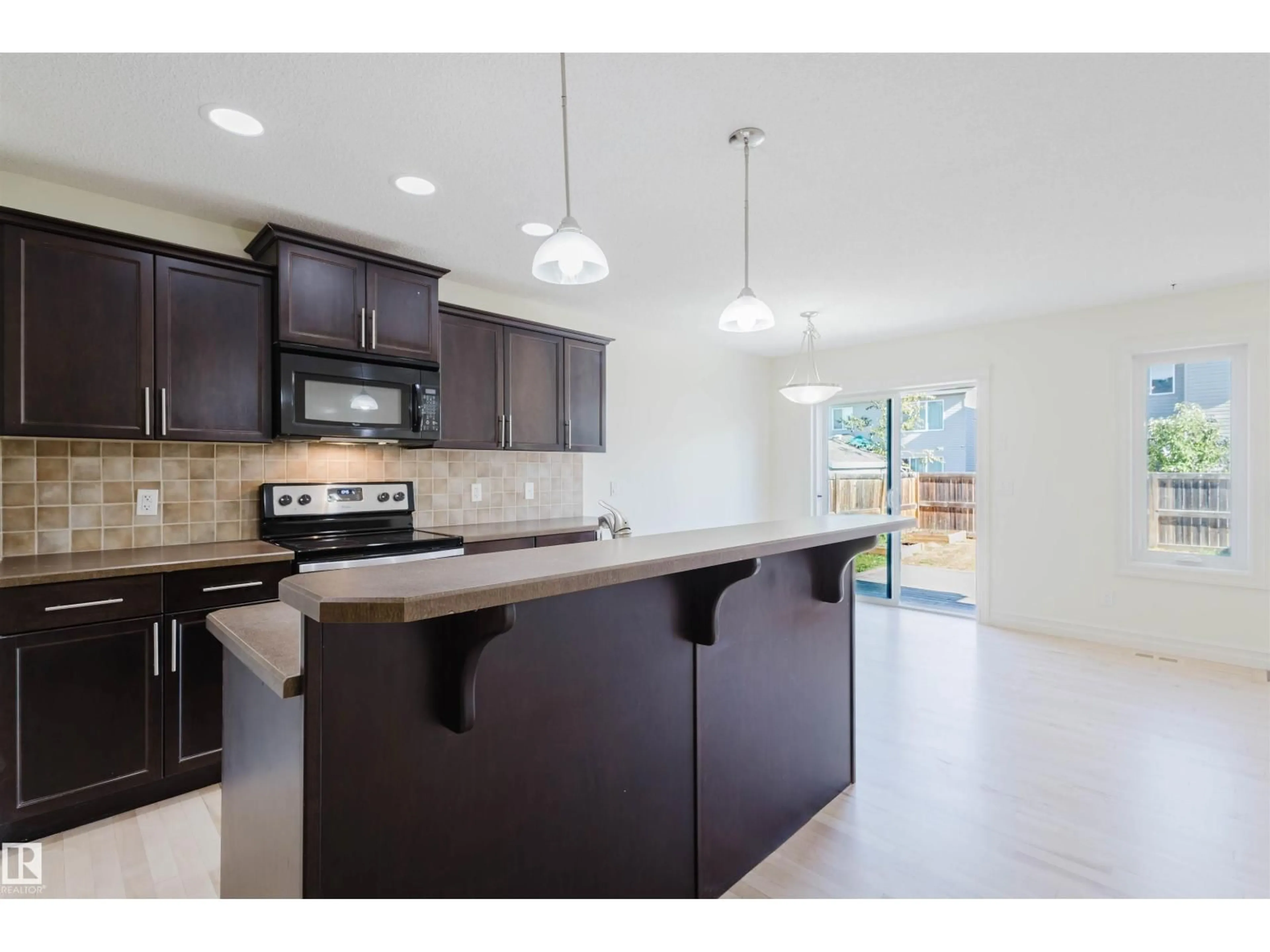 Open concept kitchen, ceramic/tile floor for 33 CATALINA CT, Fort Saskatchewan Alberta T8L0K5