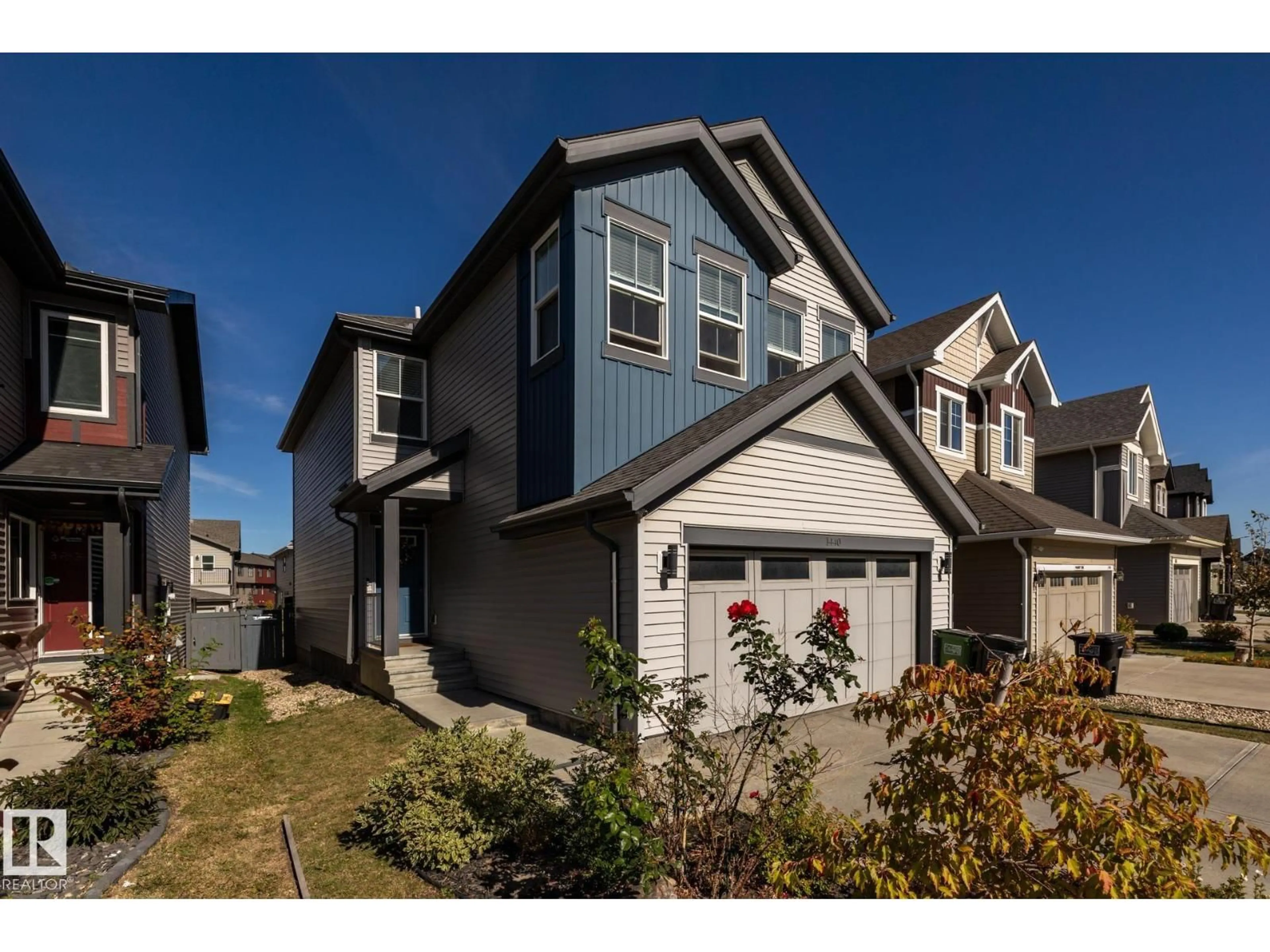 Home with vinyl exterior material, street for 1440 DARBY GREEN SW, Edmonton Alberta T6W4N5