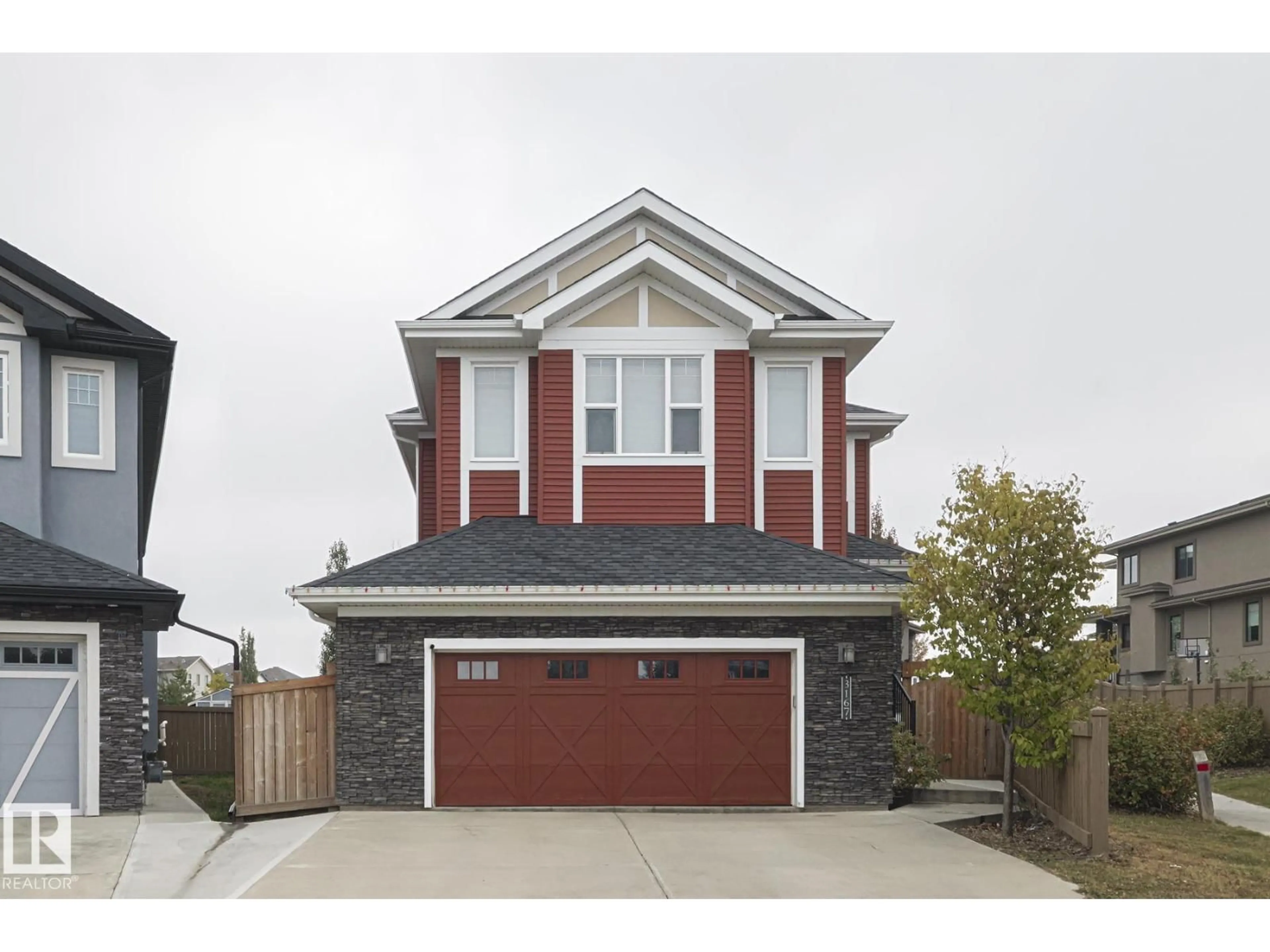 Home with vinyl exterior material, street for 3167 WINSPEAR CR, Edmonton Alberta T6X1S8