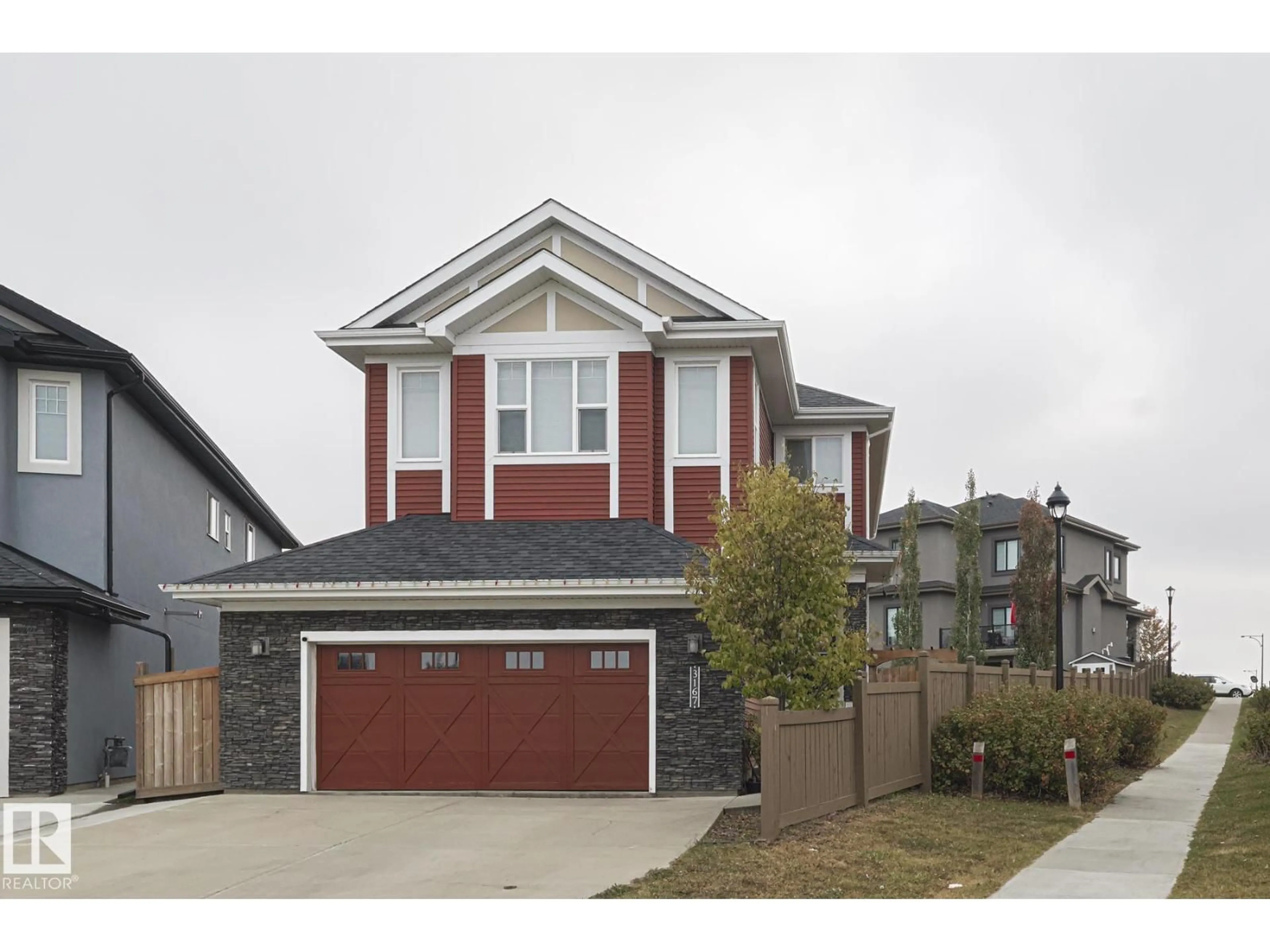 Home with vinyl exterior material, street for 3167 WINSPEAR CR, Edmonton Alberta T6X1S8