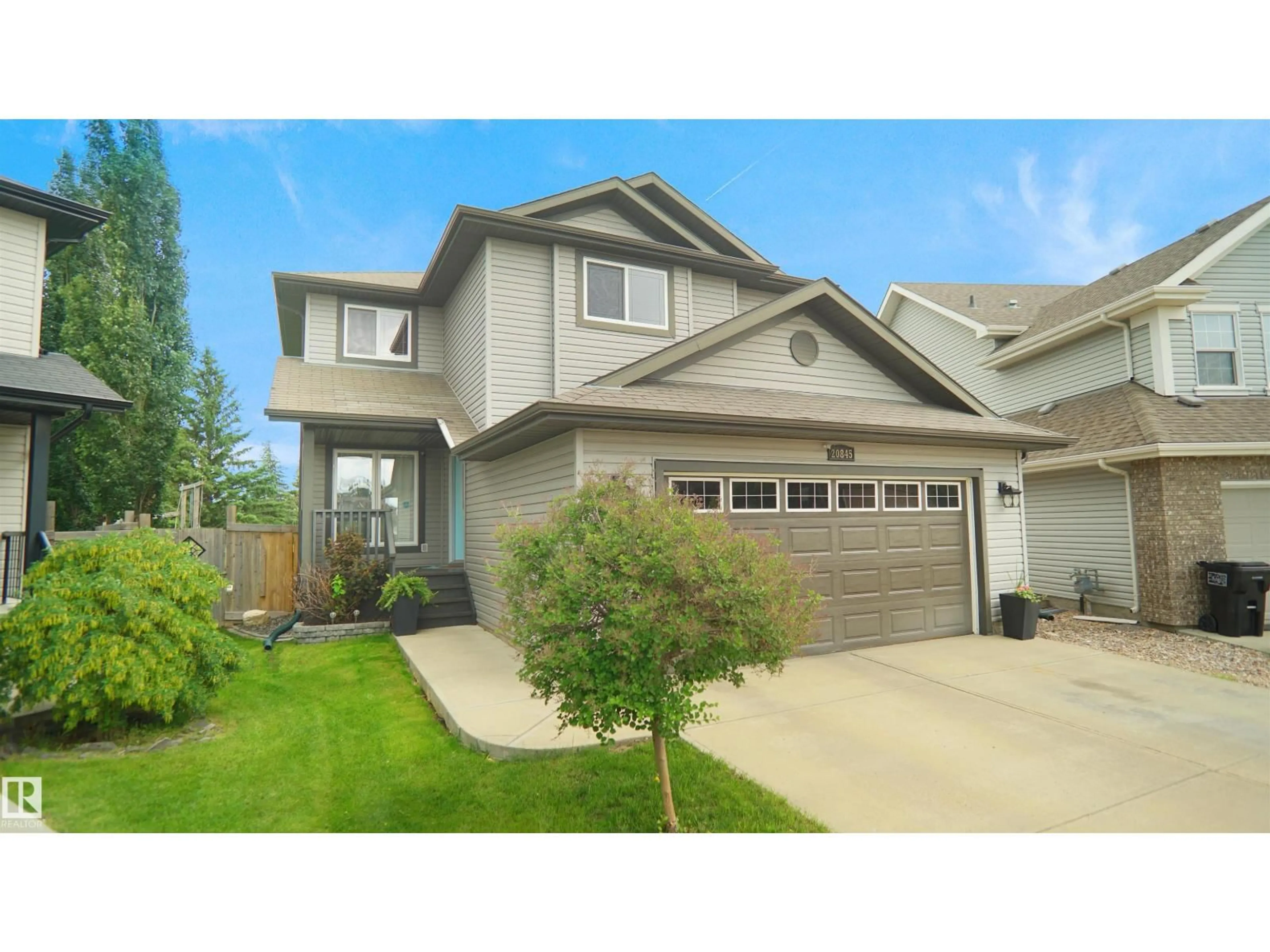 Home with vinyl exterior material, street for 20845 92A AV, Edmonton Alberta T5T3Z1