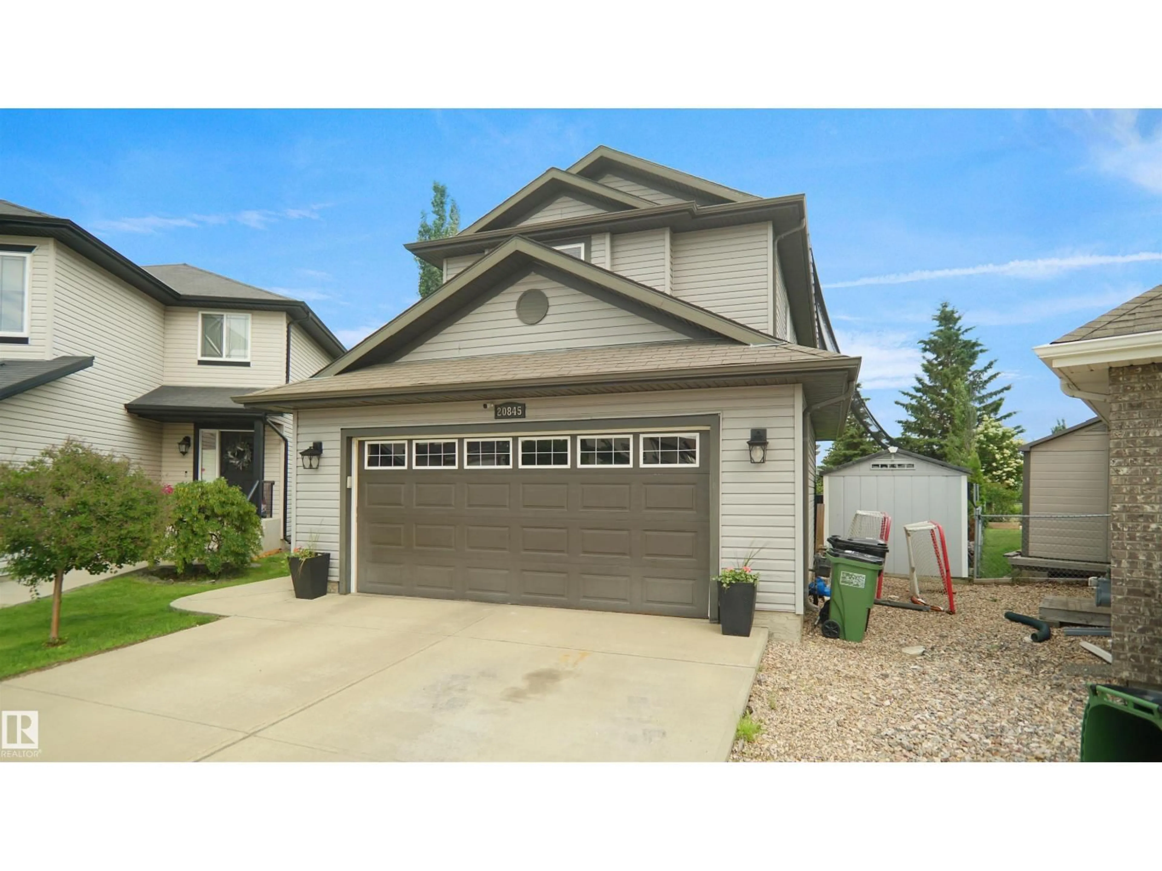 Home with vinyl exterior material, street for 20845 92A AV, Edmonton Alberta T5T3Z1