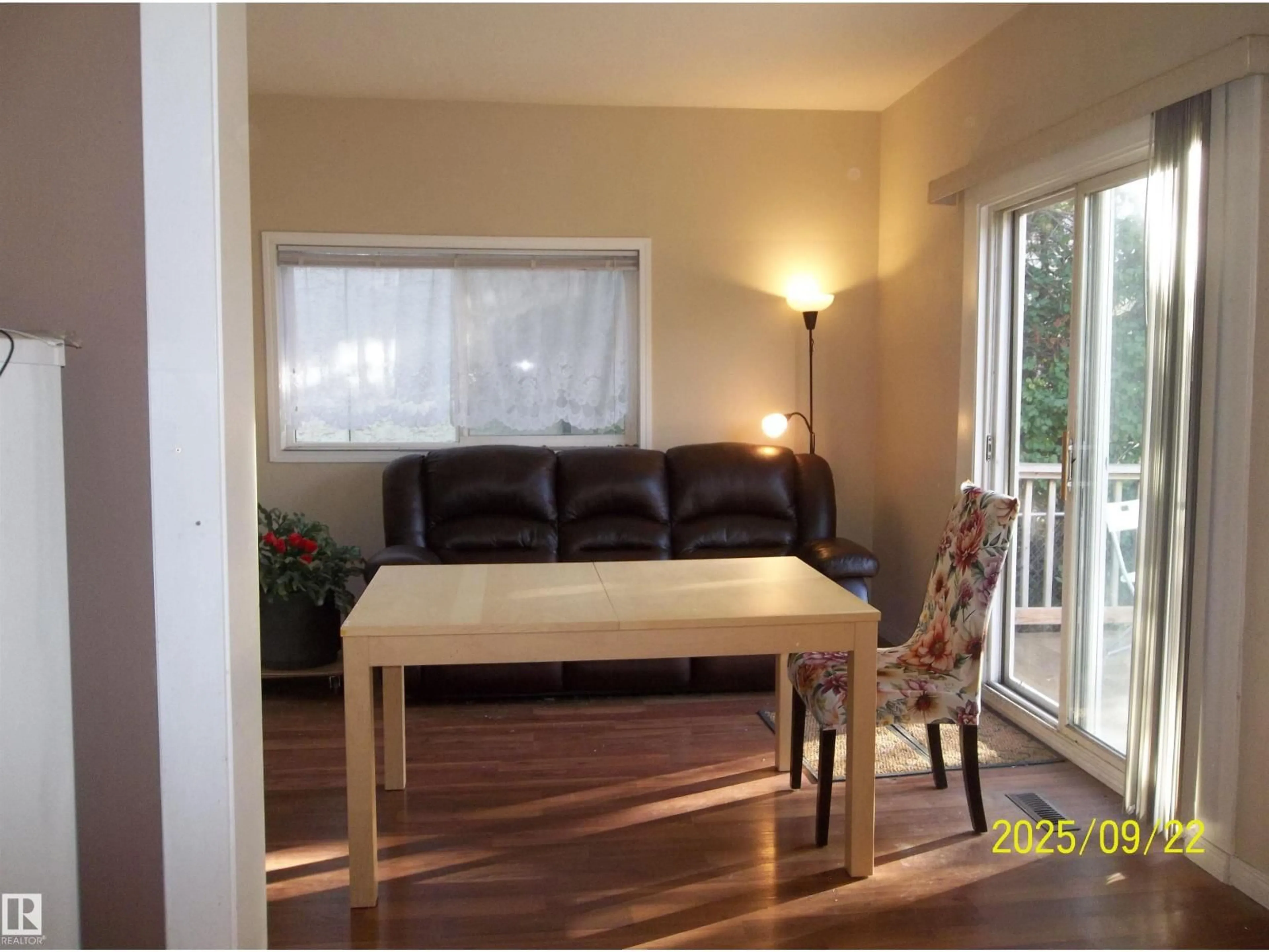Living room with furniture, wood/laminate floor for NW - 11824 79 ST, Edmonton Alberta T5B2L1
