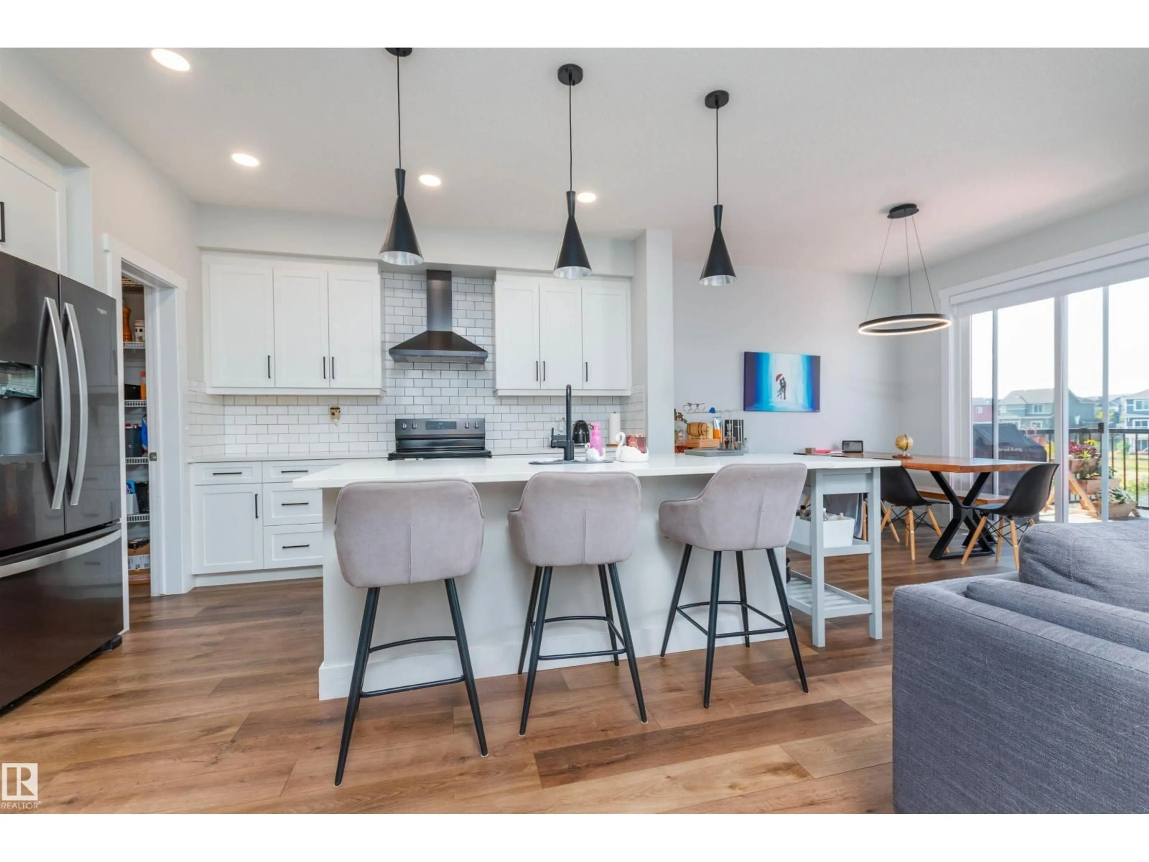 Open concept kitchen, wood/laminate floor for 3805 CHERRY LO, Edmonton Alberta T6X2K7