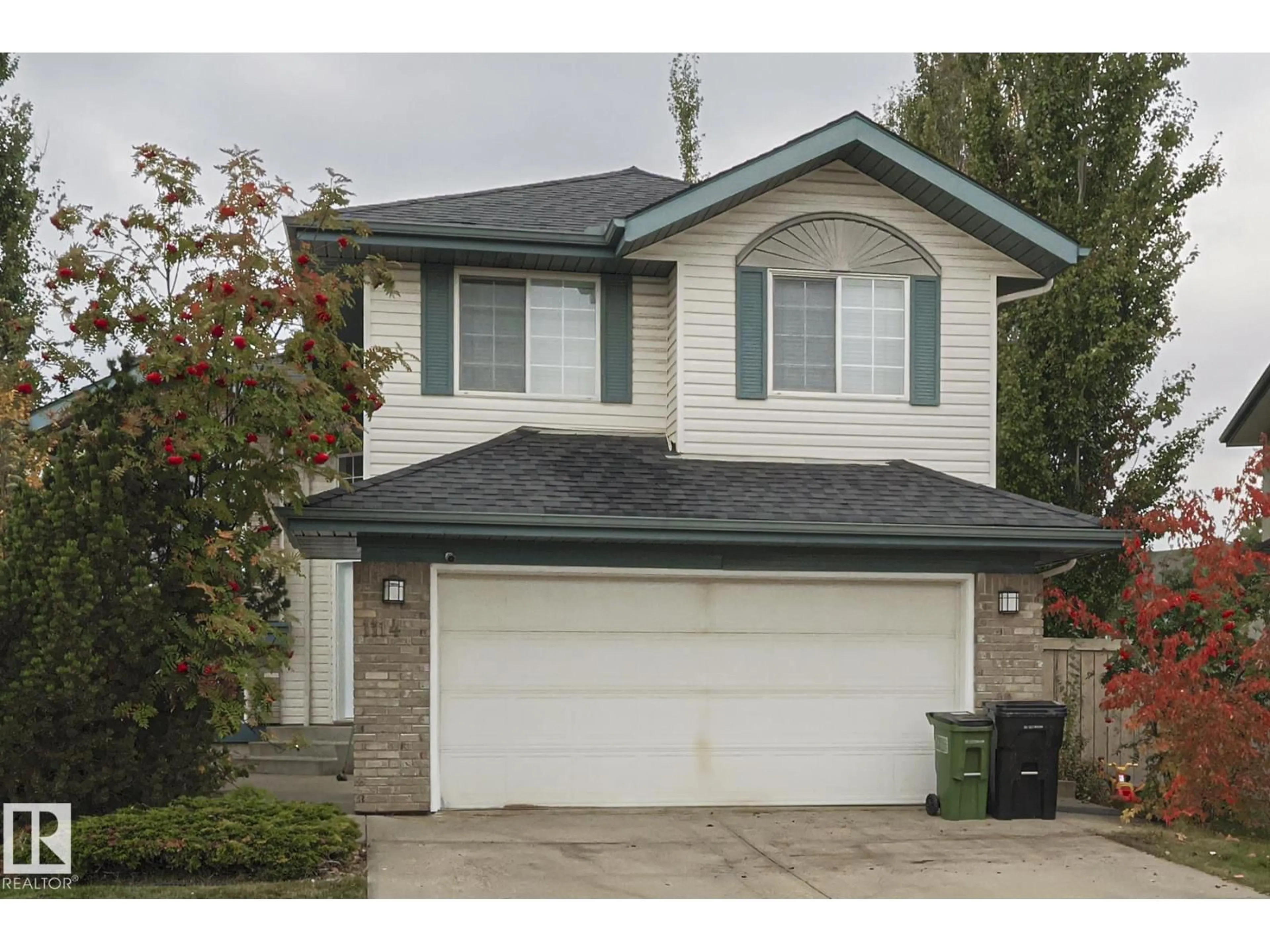 Home with vinyl exterior material, street for NW - 1114 116 ST, Edmonton Alberta T6J6Y3