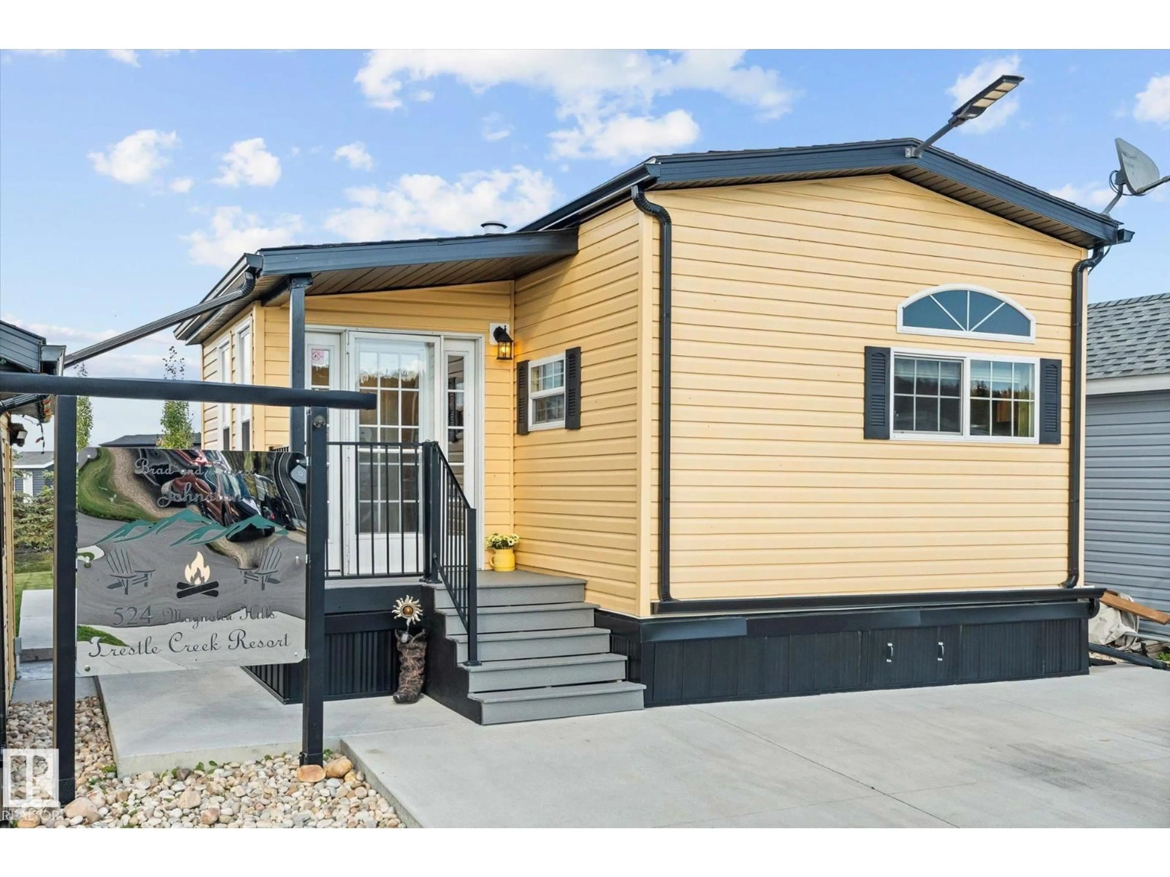 Home with vinyl exterior material, street for 524 - 53126 RGE ROAD 70, Rural Parkland County Alberta T0E0S0