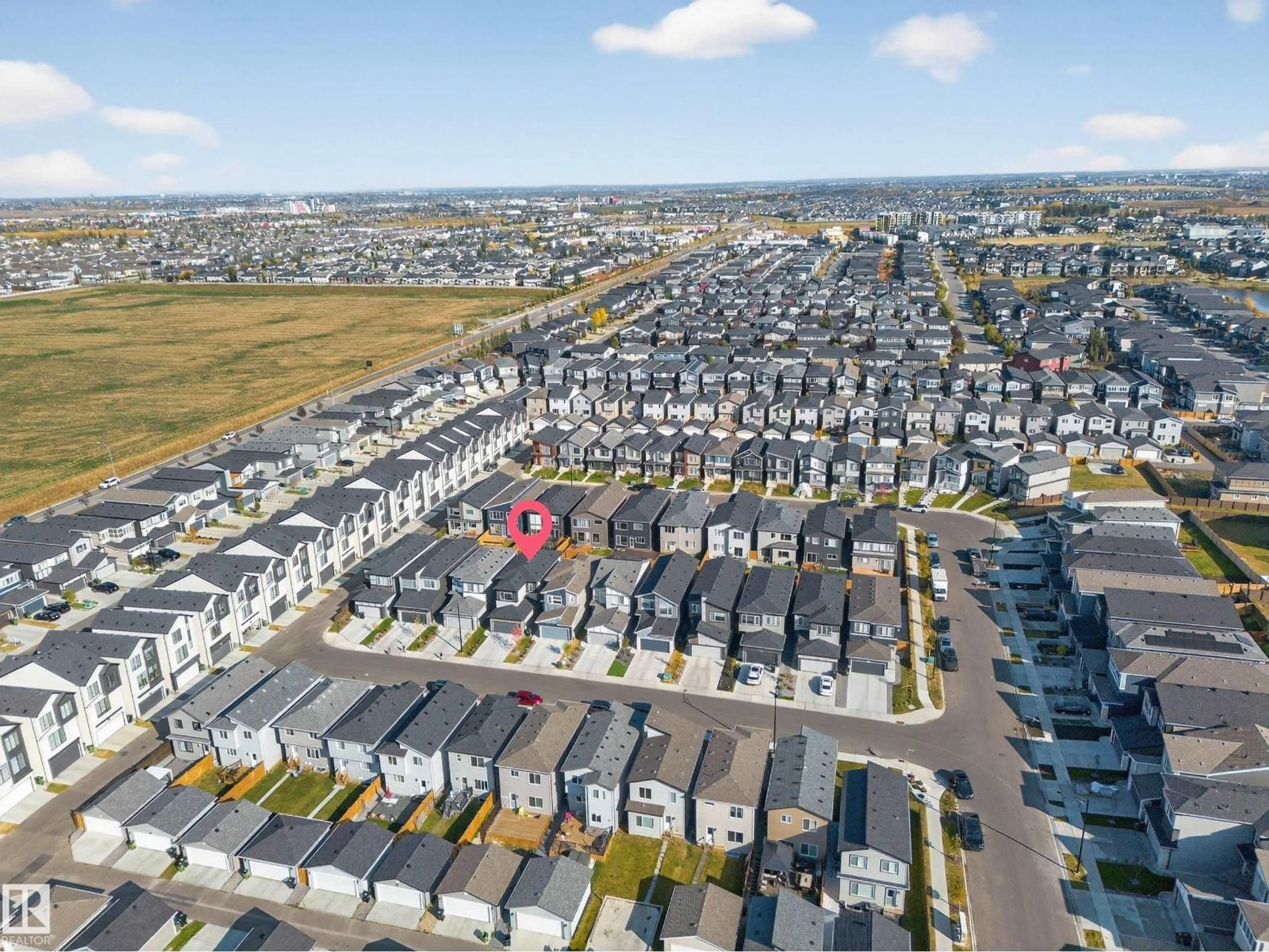 A pic from outside/outdoor area/front of a property/back of a property/a pic from drone, street for LI SW - 3517 KULAY LINK, Edmonton Alberta T6W5H3