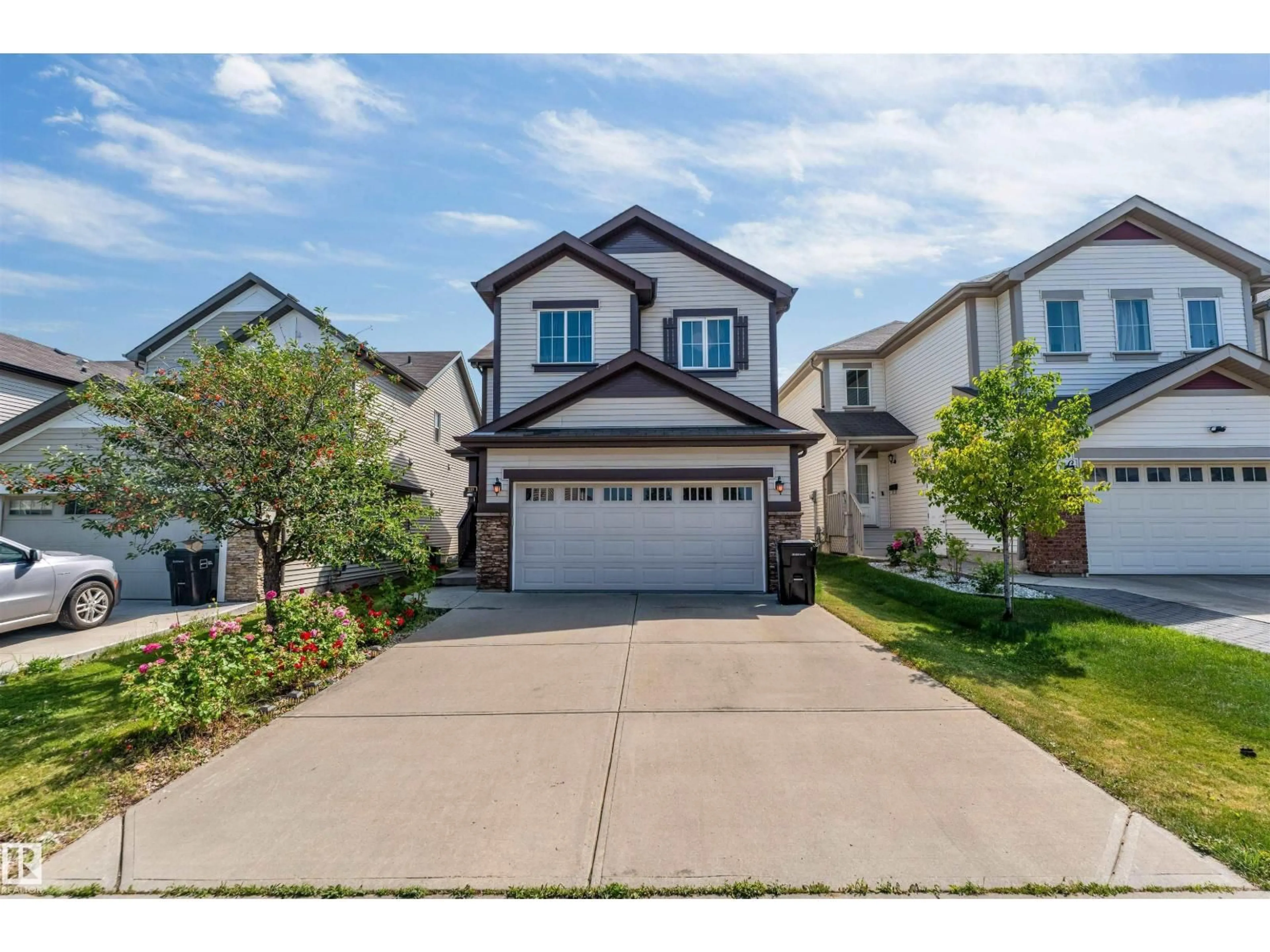 Home with vinyl exterior material, street for 1115 61 ST, Edmonton Alberta T6X0M5
