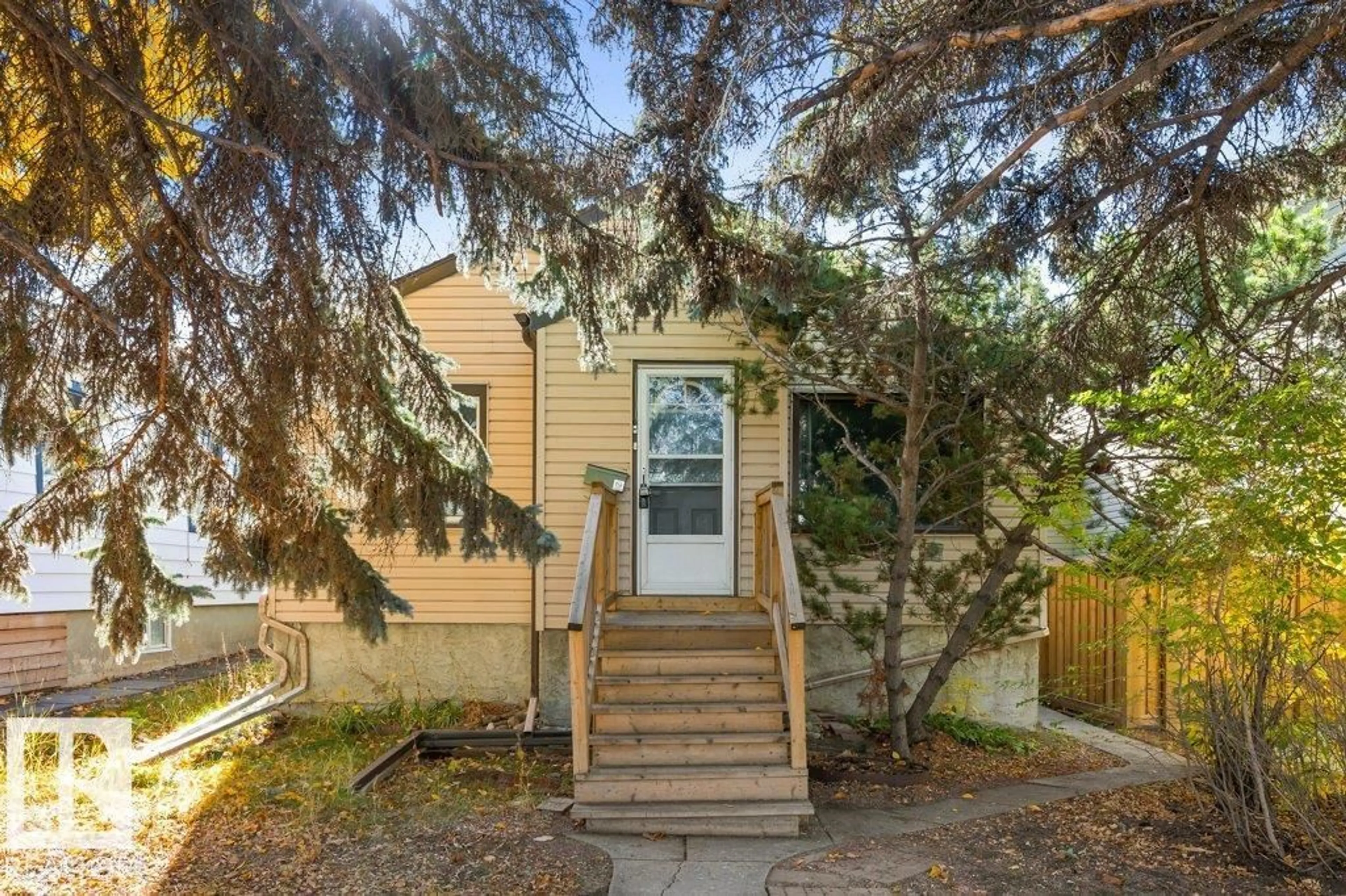 Home with vinyl exterior material, street for 10749 72 AV, Edmonton Alberta T6E1A2