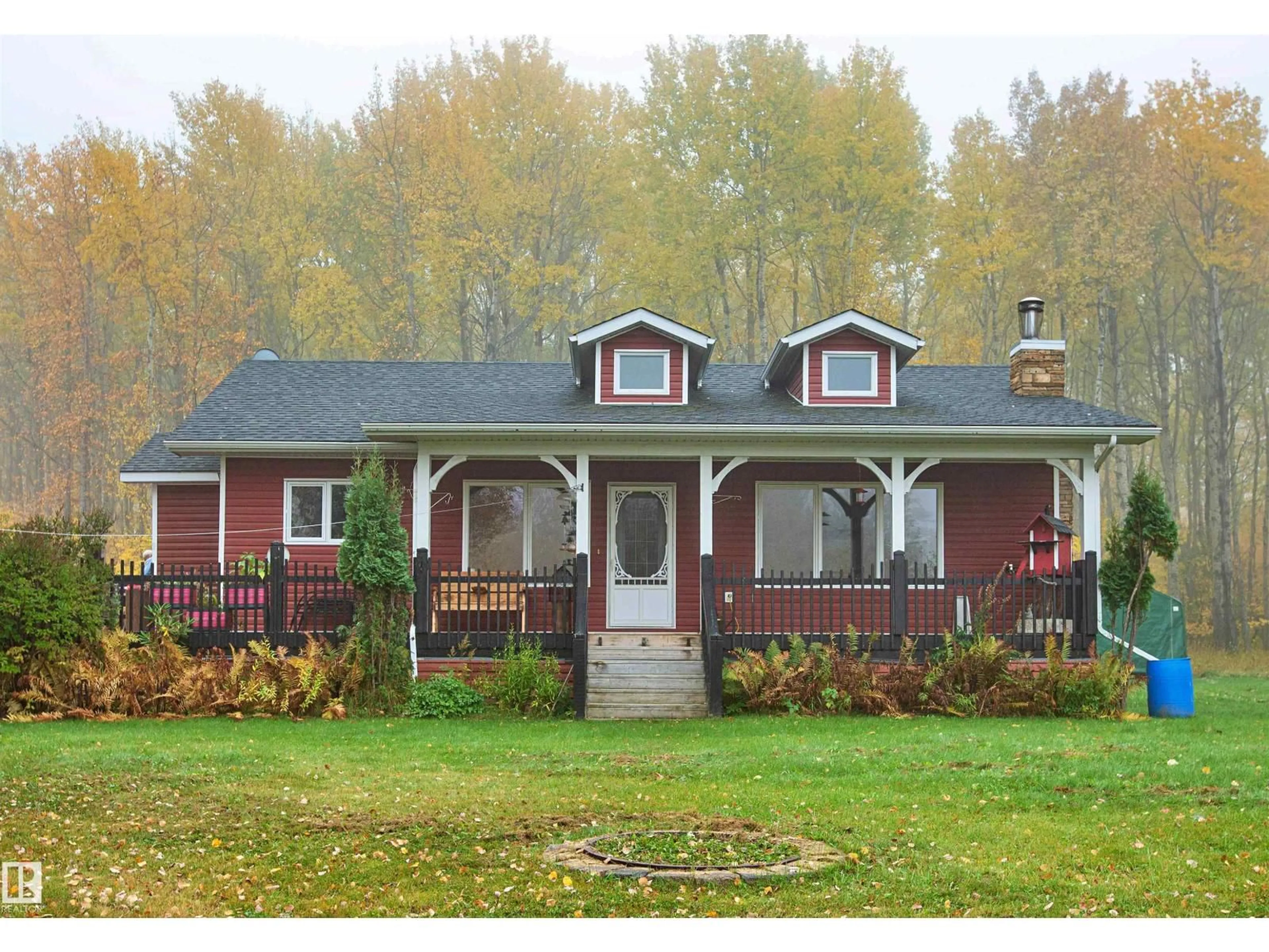 Home with vinyl exterior material, street for 34 102062 TWP ROAD ROAD, Rural Woodlands County Alberta T0E0B0