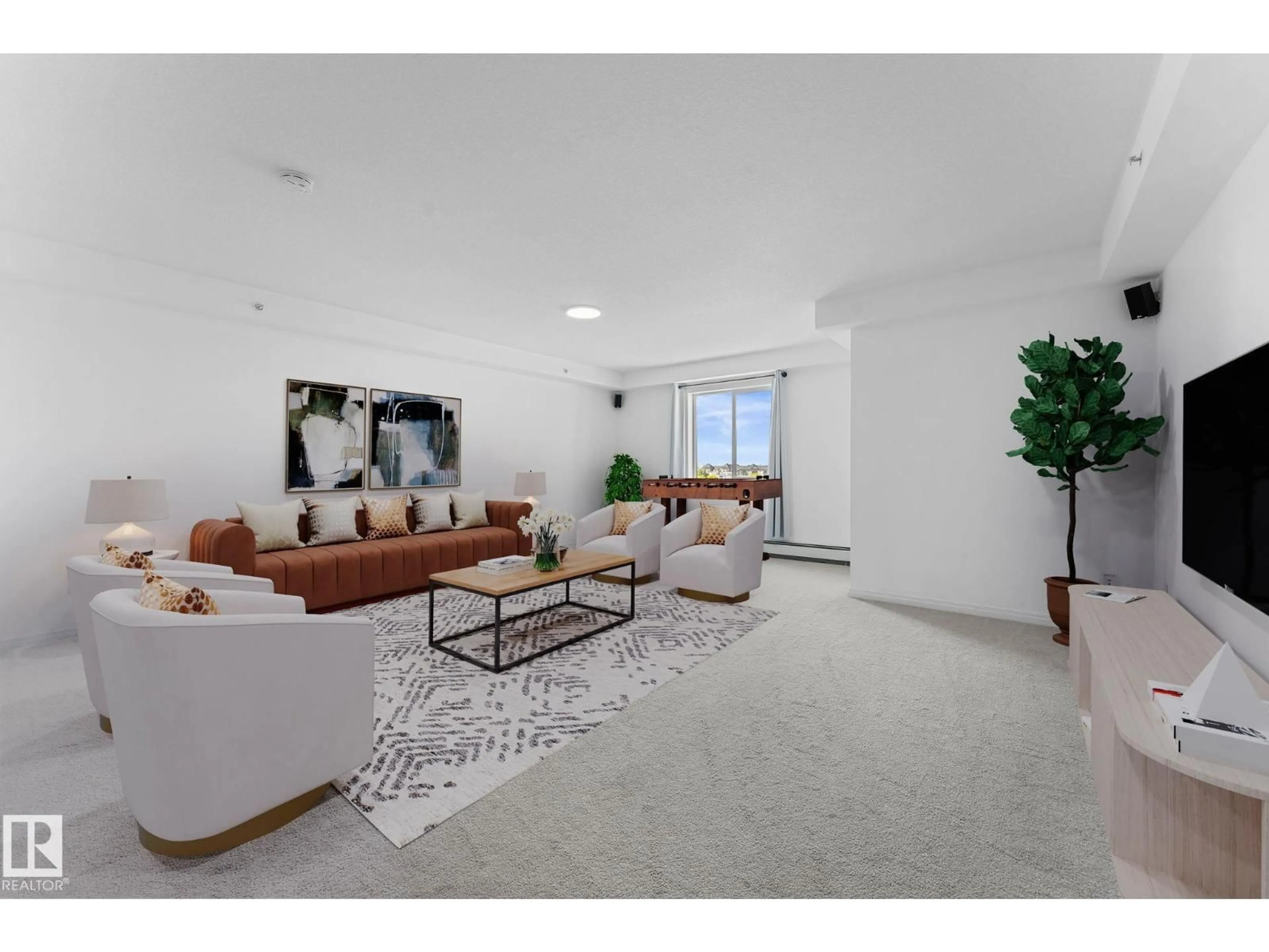 Living room with furniture, unknown for 420 12550 140 AV NW, Edmonton Alberta T5X6J4