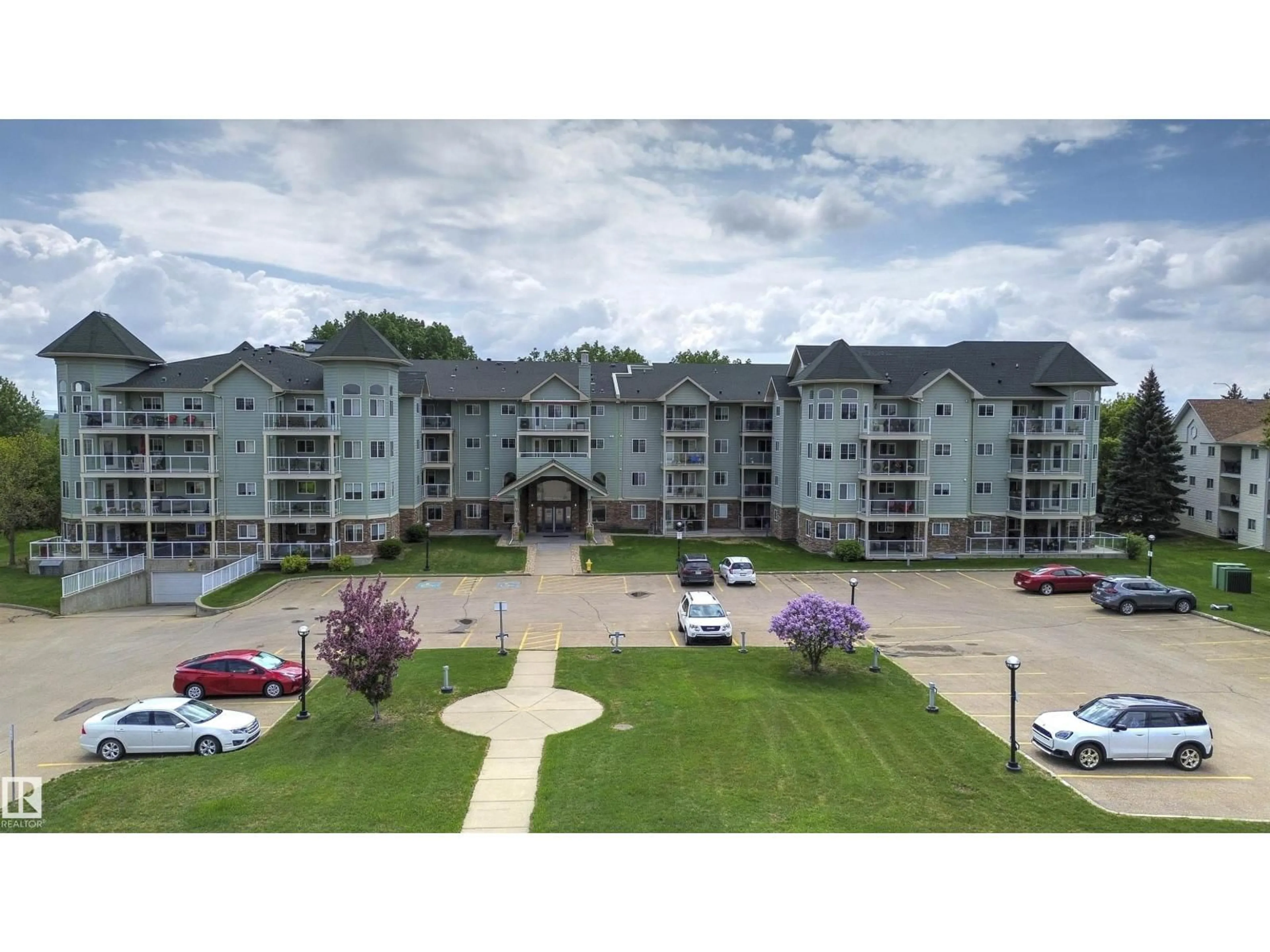 A pic from outside/outdoor area/front of a property/back of a property/a pic from drone, unknown for #305 - 9995 93 AV, Fort Saskatchewan Alberta T8L1N5
