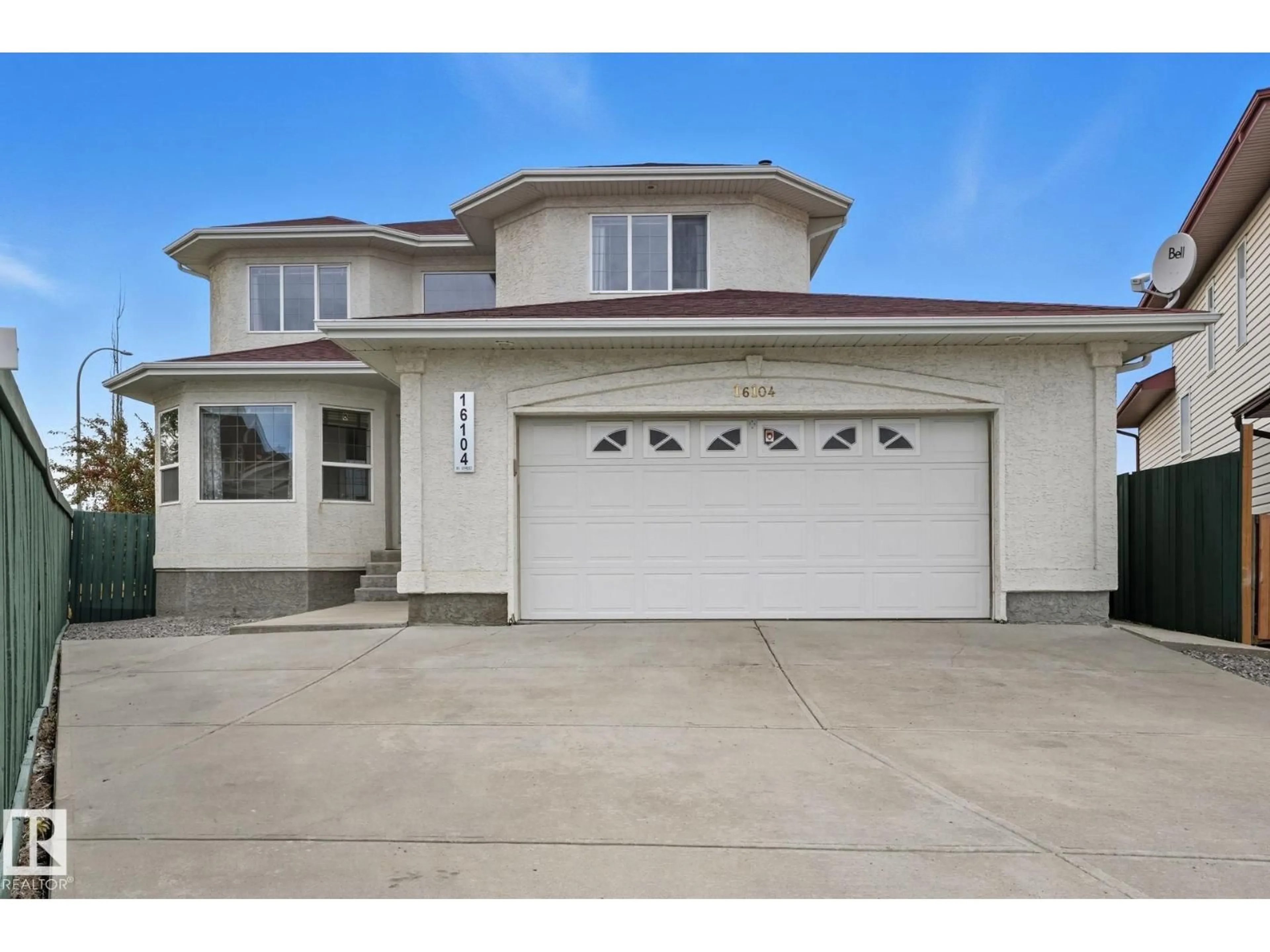 Home with vinyl exterior material, street for NW - 16104 81 ST, Edmonton Alberta T5Z3E4