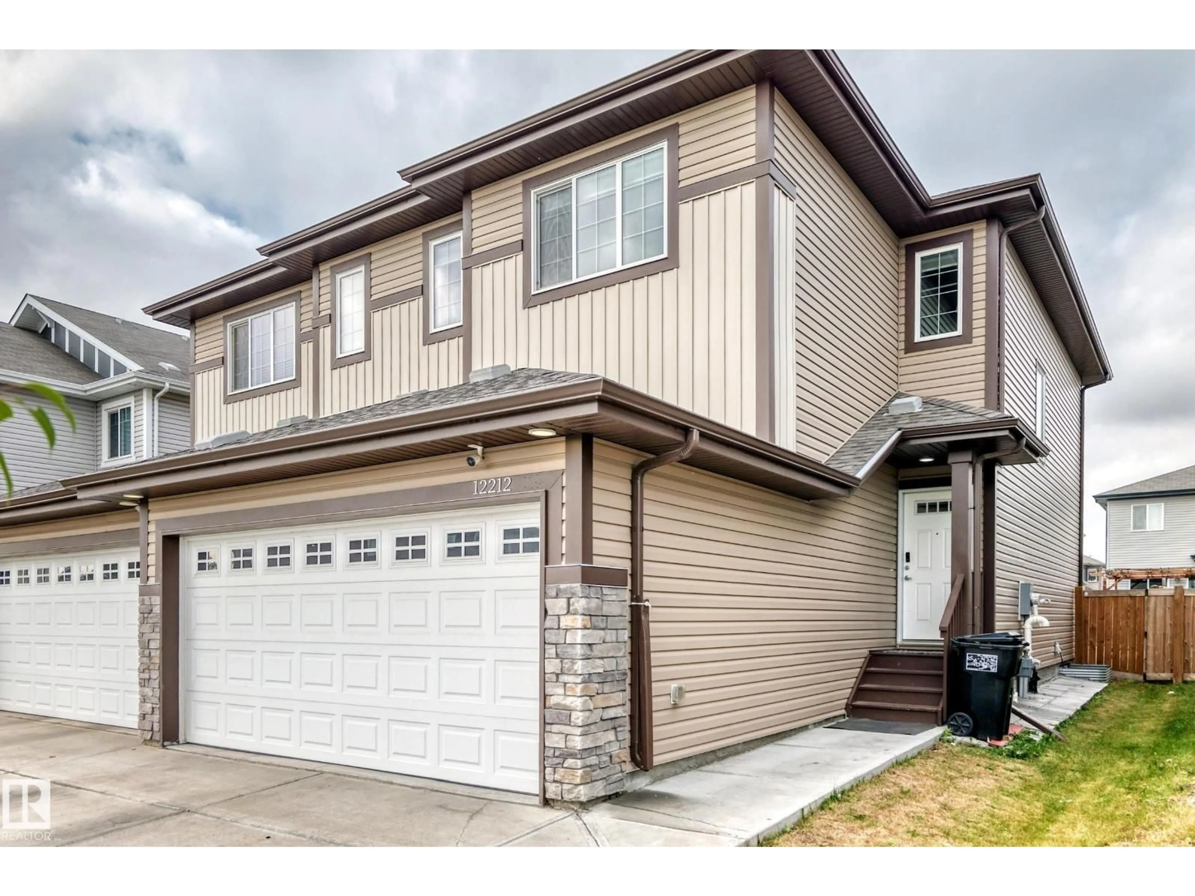 Home with vinyl exterior material, street for NW - 12212 176 AV, Edmonton Alberta T5X0L2