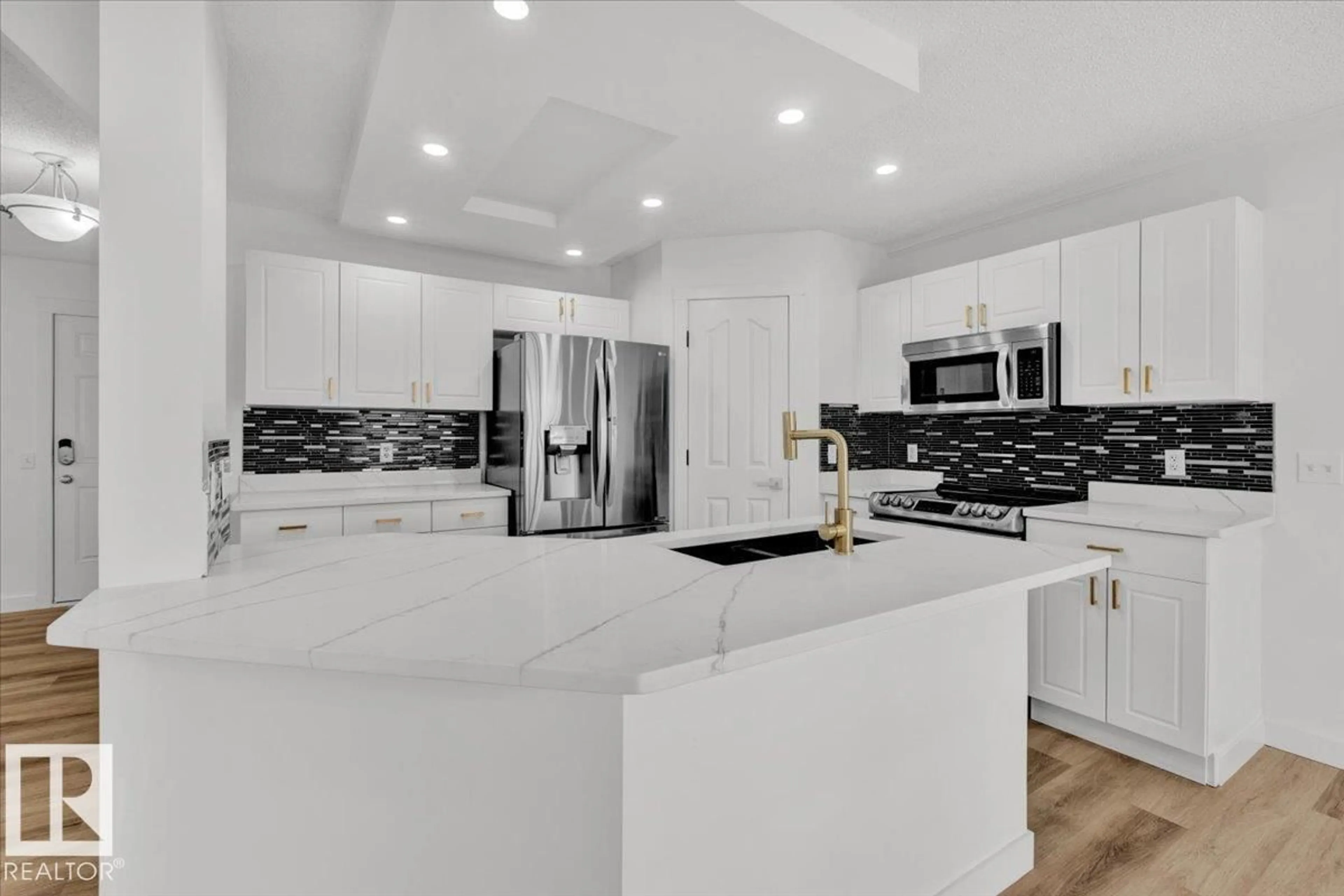 Open concept kitchen, ceramic/tile floor for 14050 159A AV, Edmonton Alberta T6V1X8