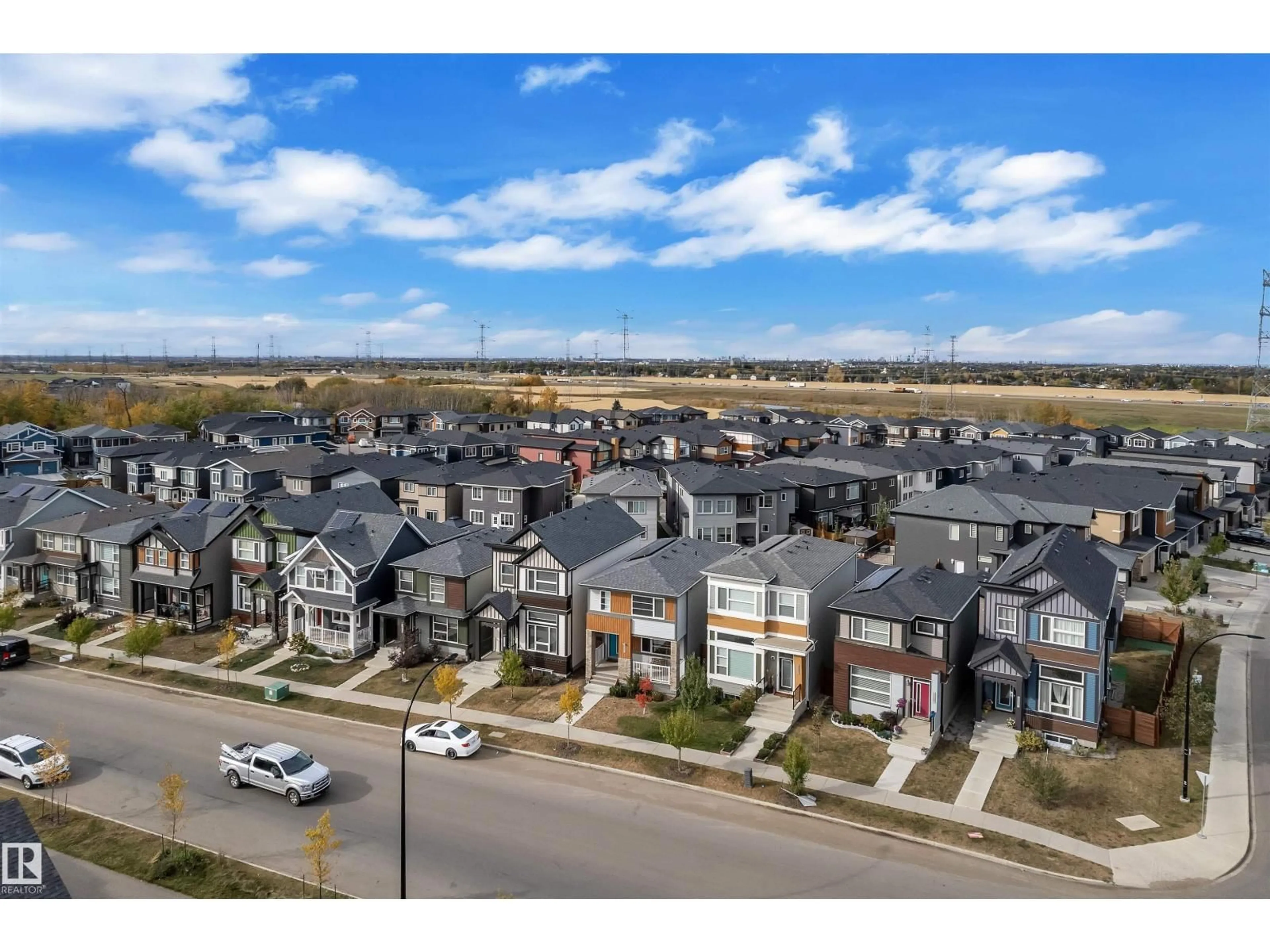 A pic from outside/outdoor area/front of a property/back of a property/a pic from drone, mountain view for 176 CHARLESWORTH DR, Edmonton Alberta T6X2W5