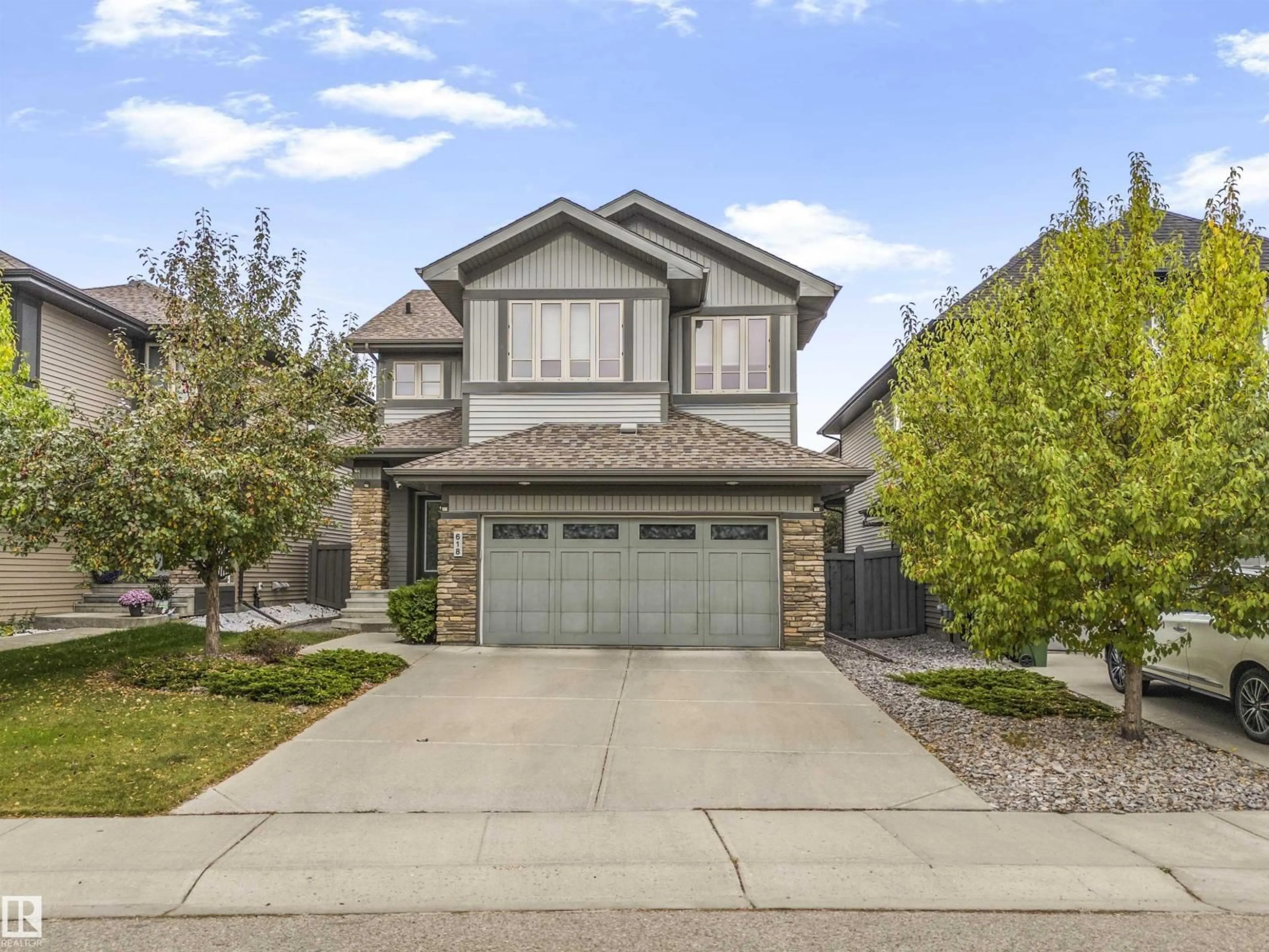Home with brick exterior material, street for 618 ADAMS WY, Edmonton Alberta T6W0J9