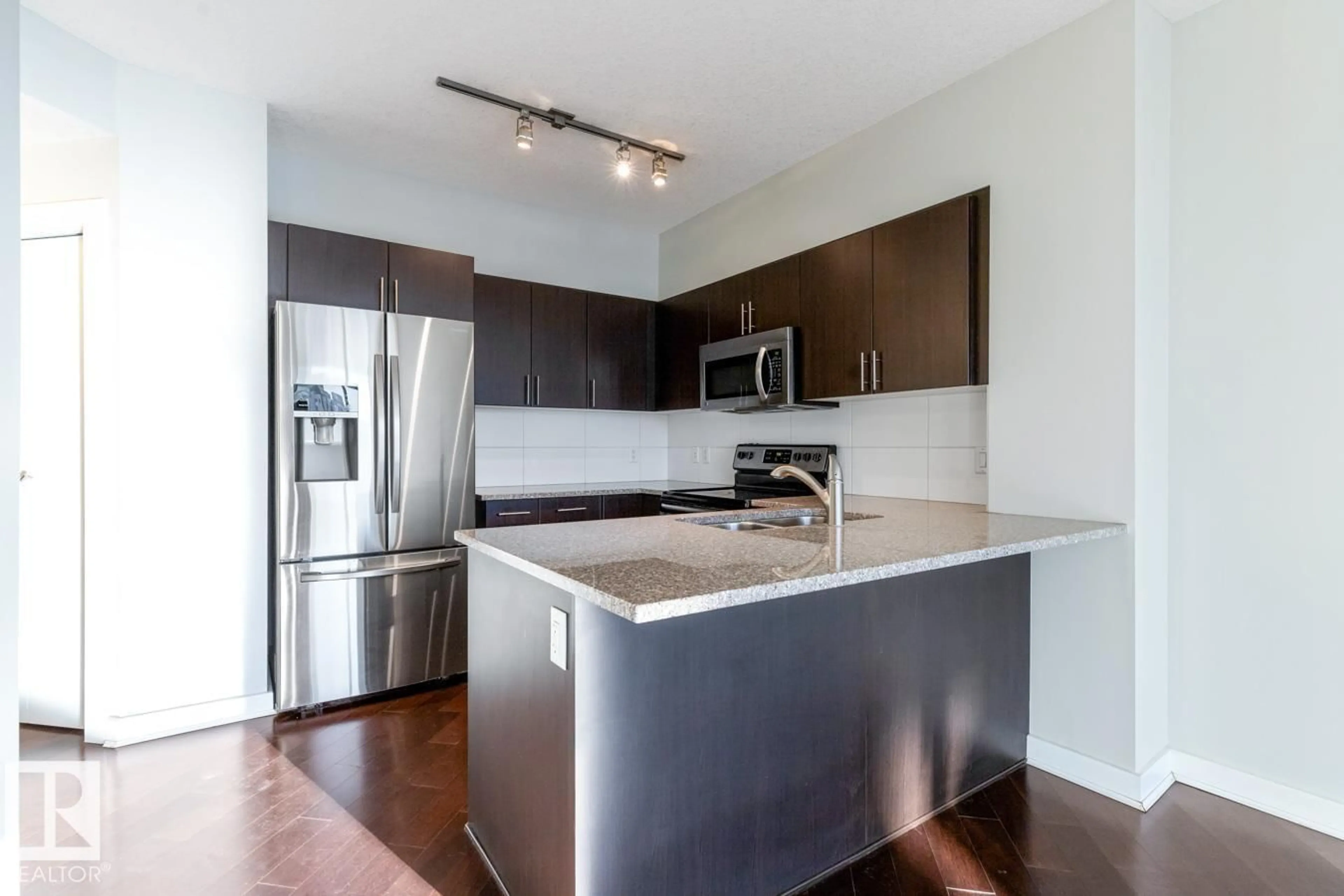 Open concept kitchen, unknown for 1004 104 ST NW, Edmonton Alberta T5J0B6