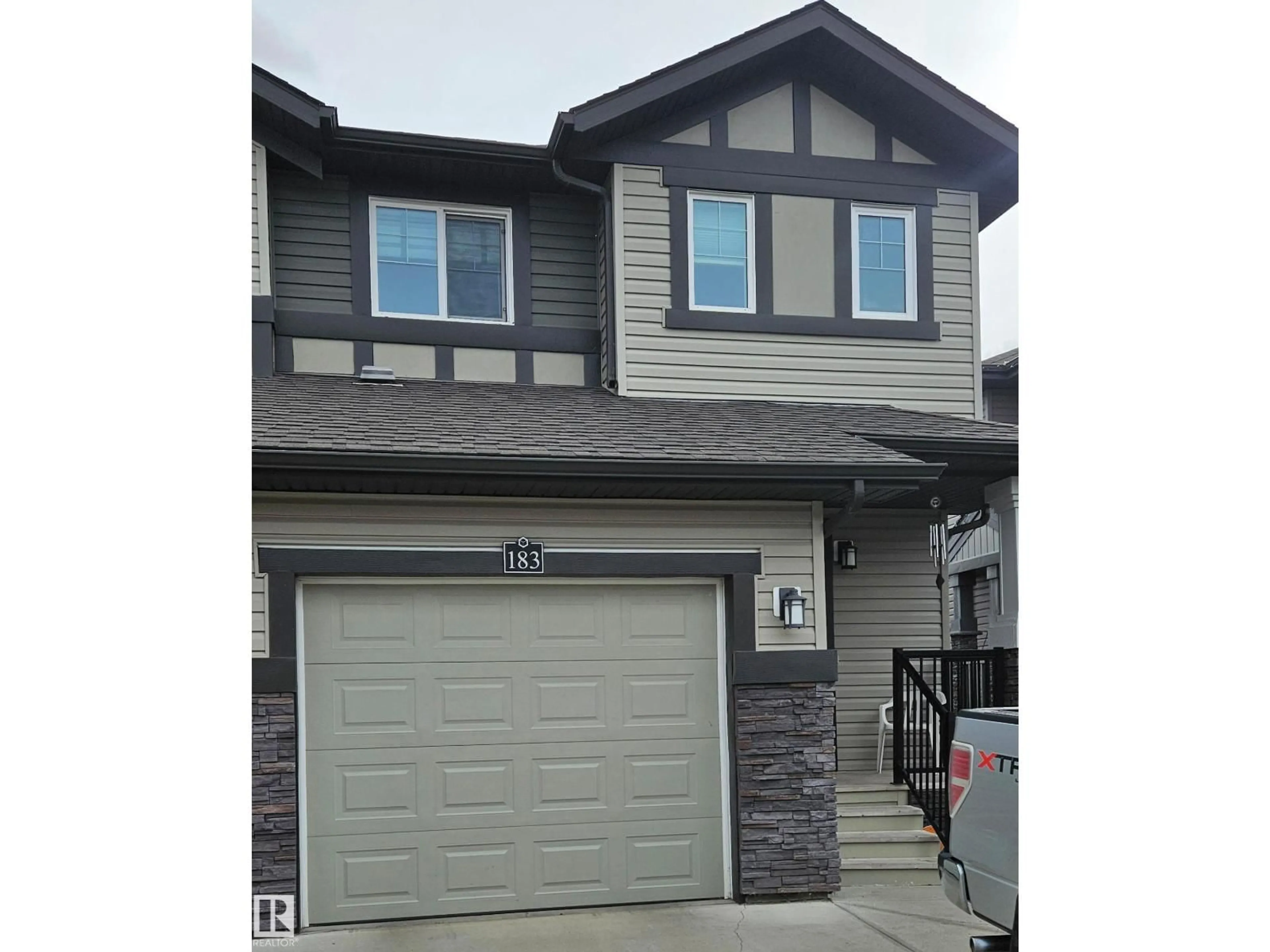 Home with vinyl exterior material, street for 183 SANTANA CR, Fort Saskatchewan Alberta T8L0T4