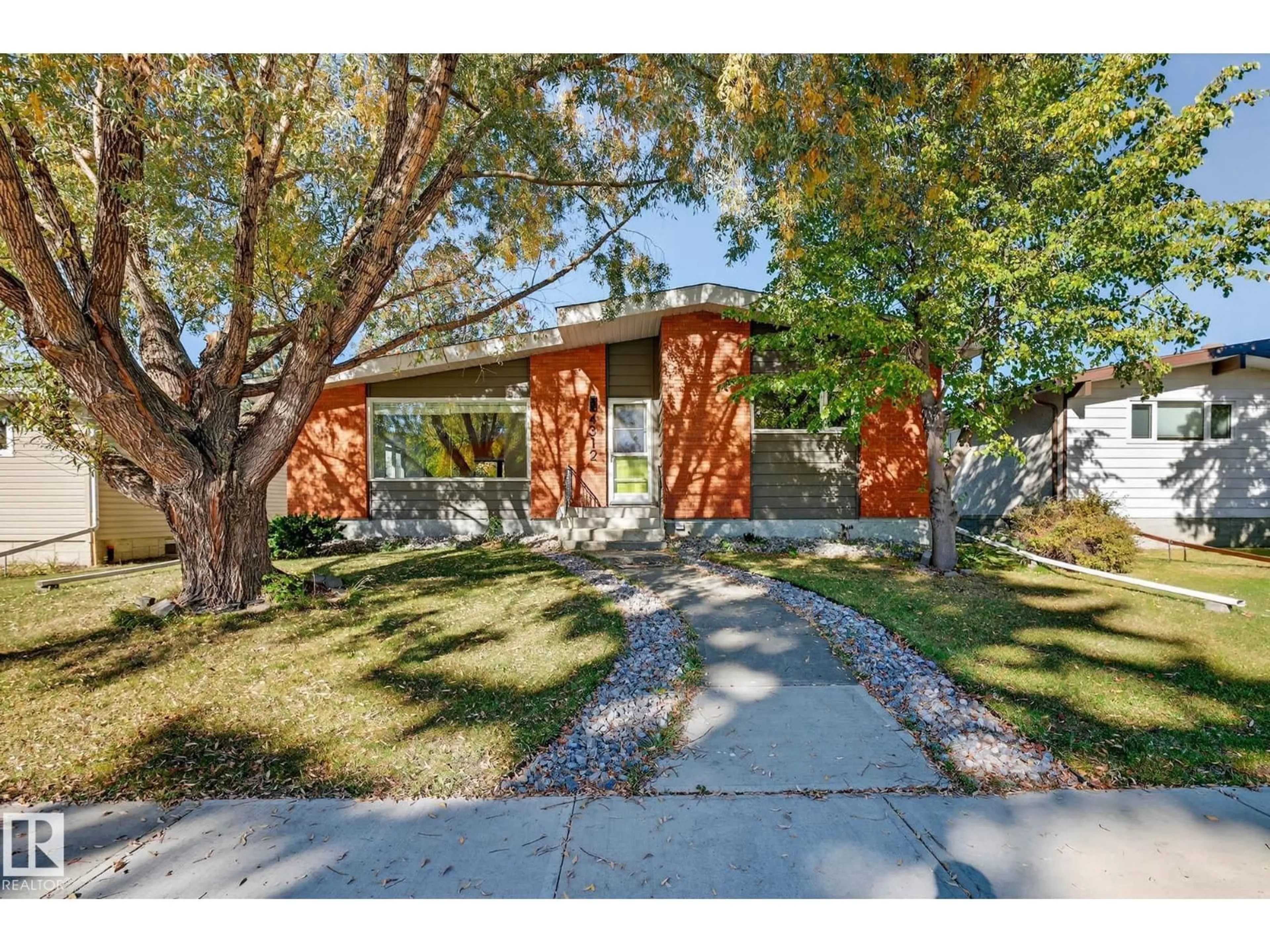 Home with brick exterior material, street for NW - 4312 117 ST, Edmonton Alberta T6J1T8