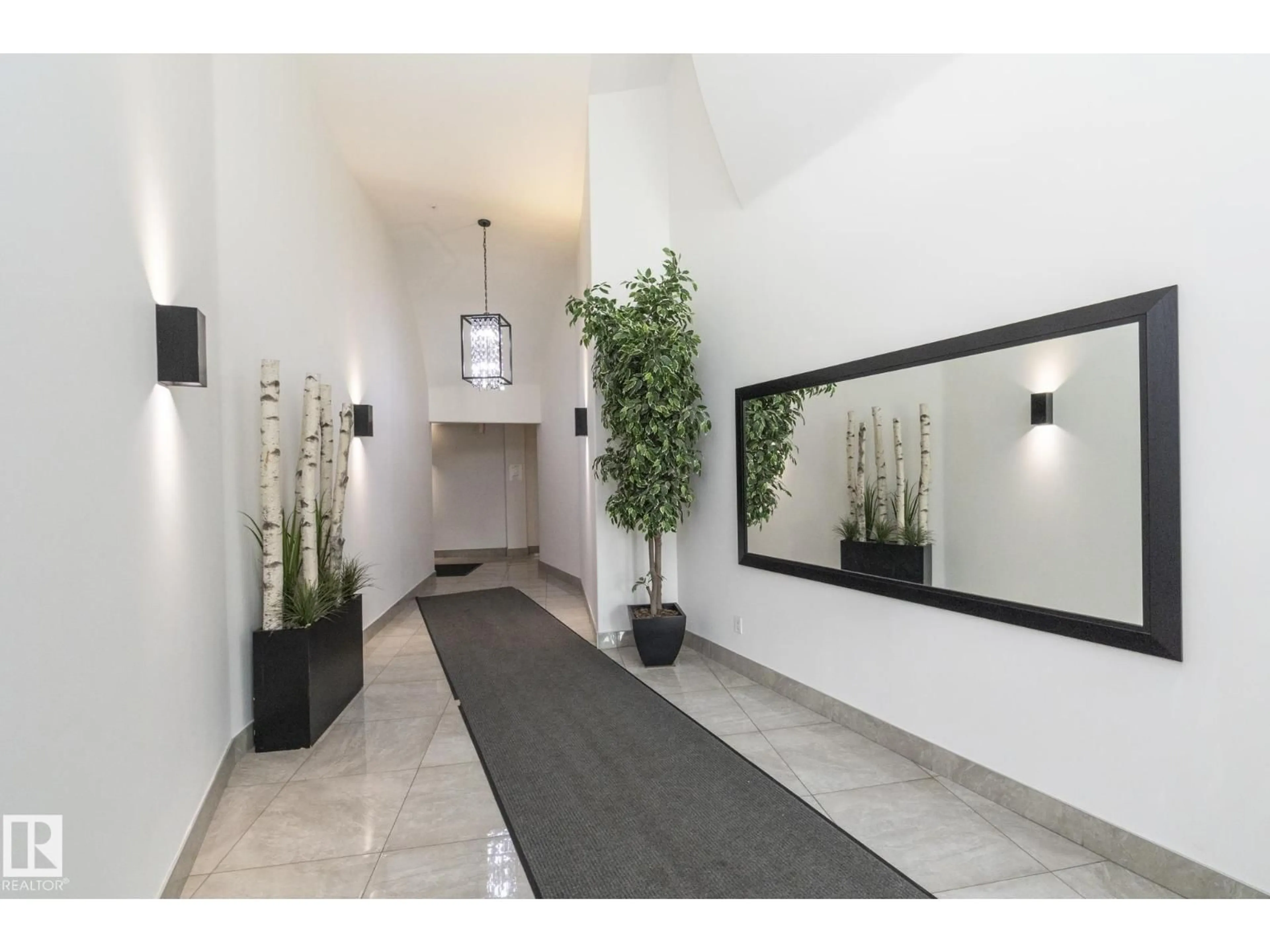 Indoor foyer for #102 - 10855 SASKATCHEWAN DR, Edmonton Alberta T6E6T6