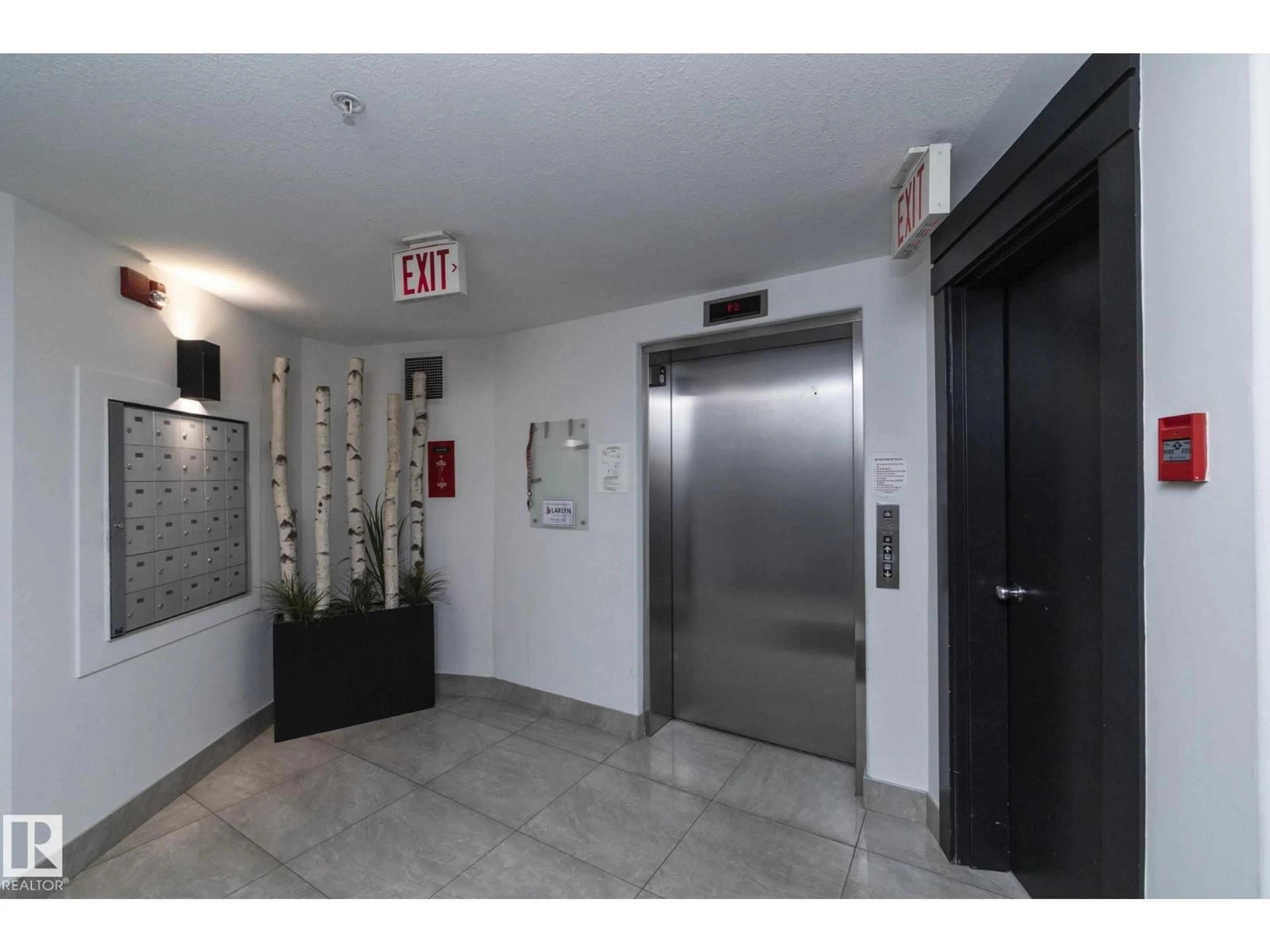 Indoor foyer for #102 - 10855 SASKATCHEWAN DR, Edmonton Alberta T6E6T6