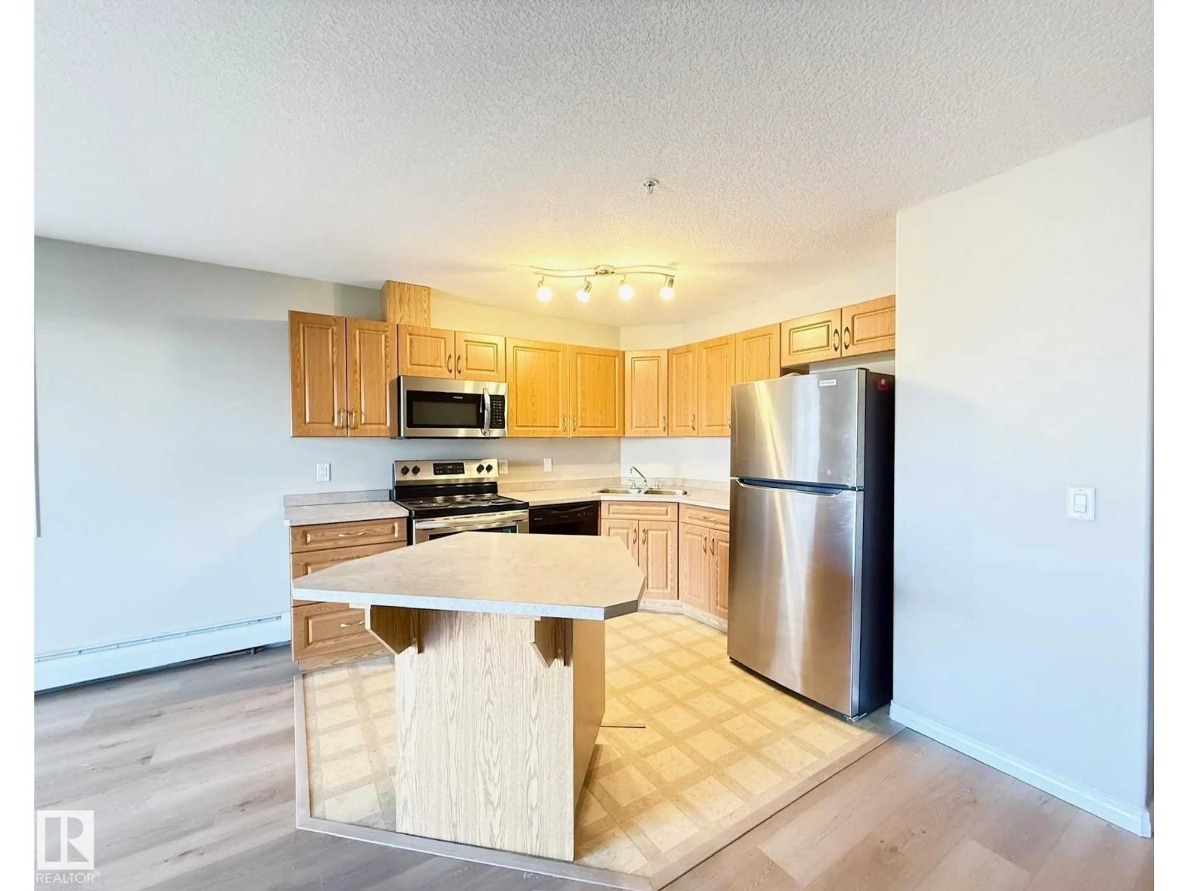 Standard kitchen, wood/laminate floor for 9945 167 ST, Edmonton Alberta T5P0K5