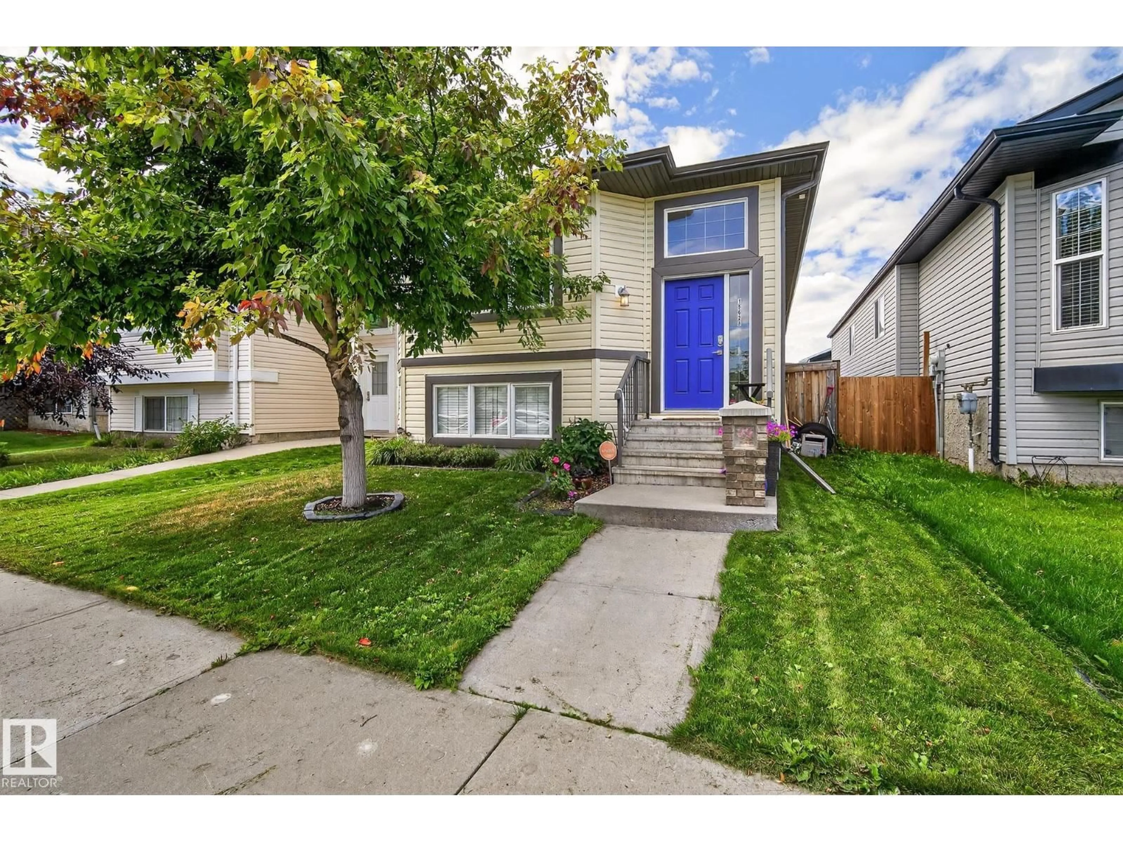 Home with vinyl exterior material, street for 15628 44 ST, Edmonton Alberta T5Y3H2